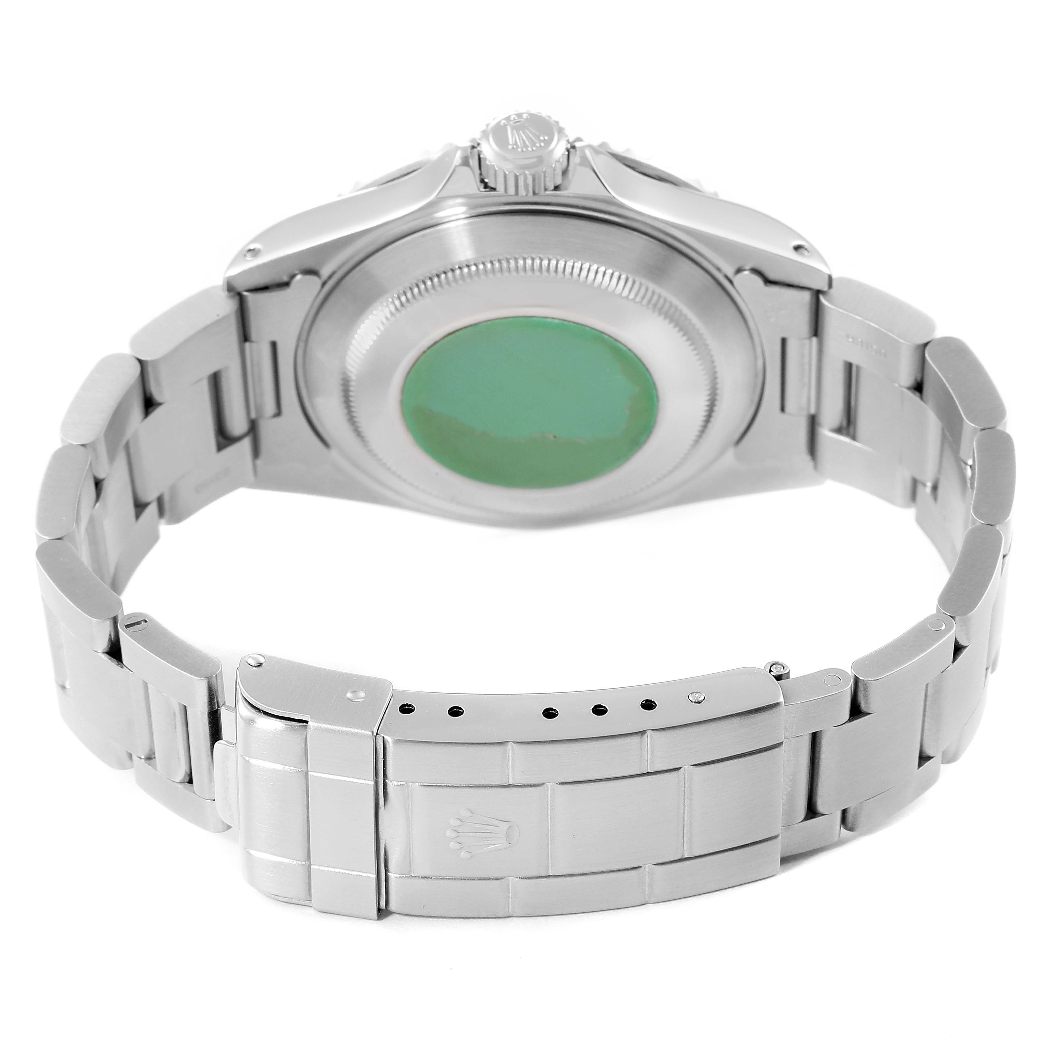 The image shows the back view of a Rolex Submariner 14060 Men
s Stainless Steel Black Dial 14060 Men
s Stainless Steel Black Dial watch, highlighting its case back, bracelet, and clasp.