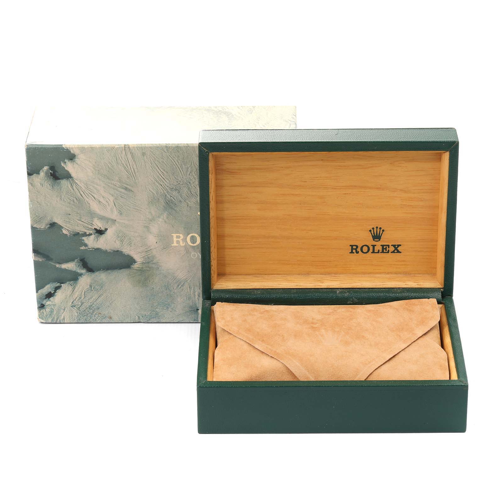 This image shows the open box and packaging for a Rolex Submariner 14060 Men
s Stainless Steel Black Dial 14060 Men
s Stainless Steel Black Dial watch.