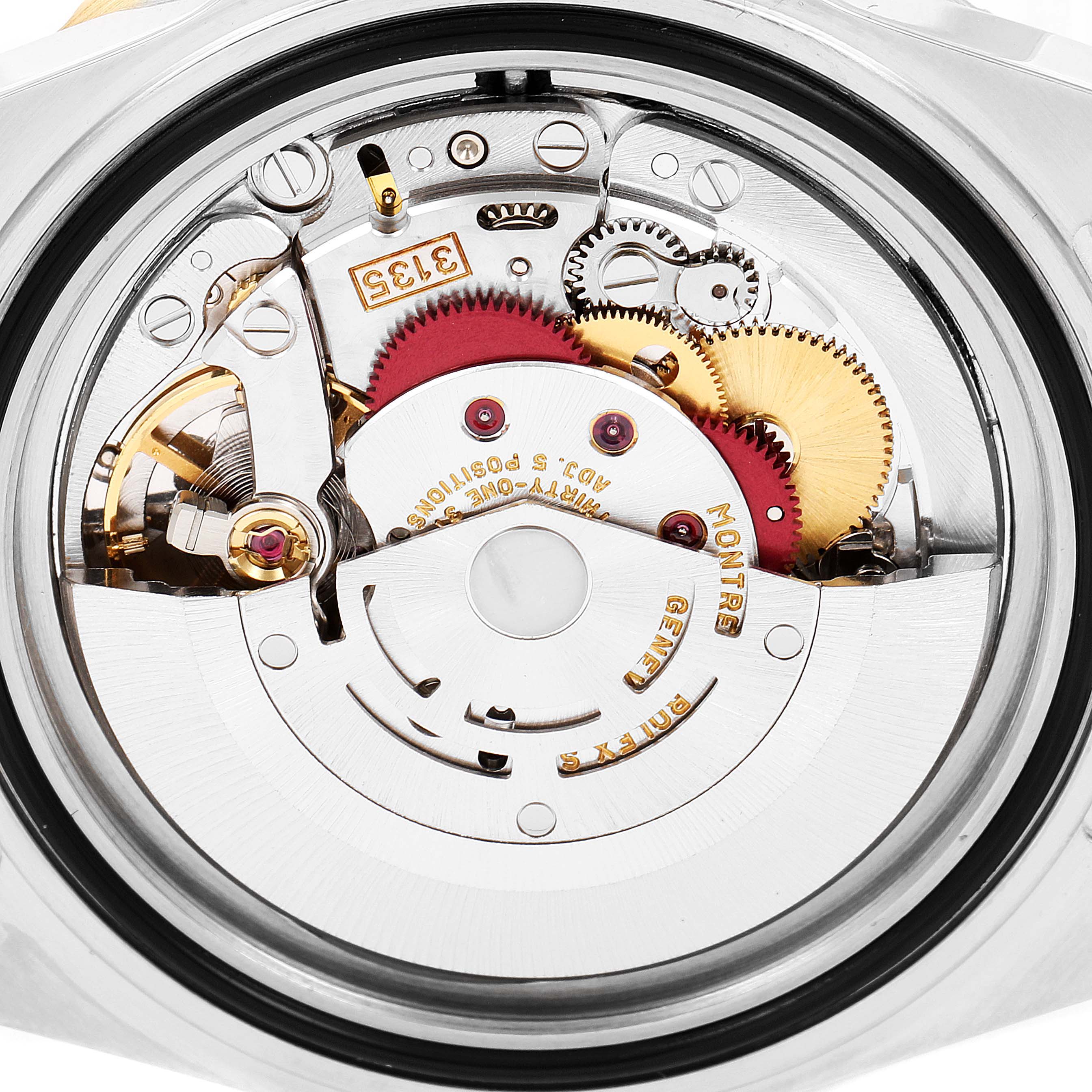 The image shows the intricate internal mechanical movement of a Rolex Submariner 16613 Men's Steel and Gold (two tone) Blue Dial 16613 Men's Steel and Gold (two tone) Blue Dial watch from a close-up, top-down angle.