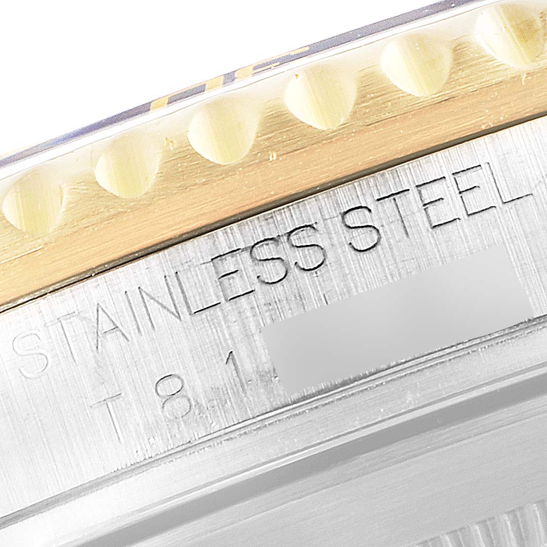 This image shows a close-up of the stainless steel case and the outer bezel of a Rolex Submariner 16613 Men's Steel and Gold (two tone) Blue Dial 16613 Men's Steel and Gold (two tone) Blue Dial watch.