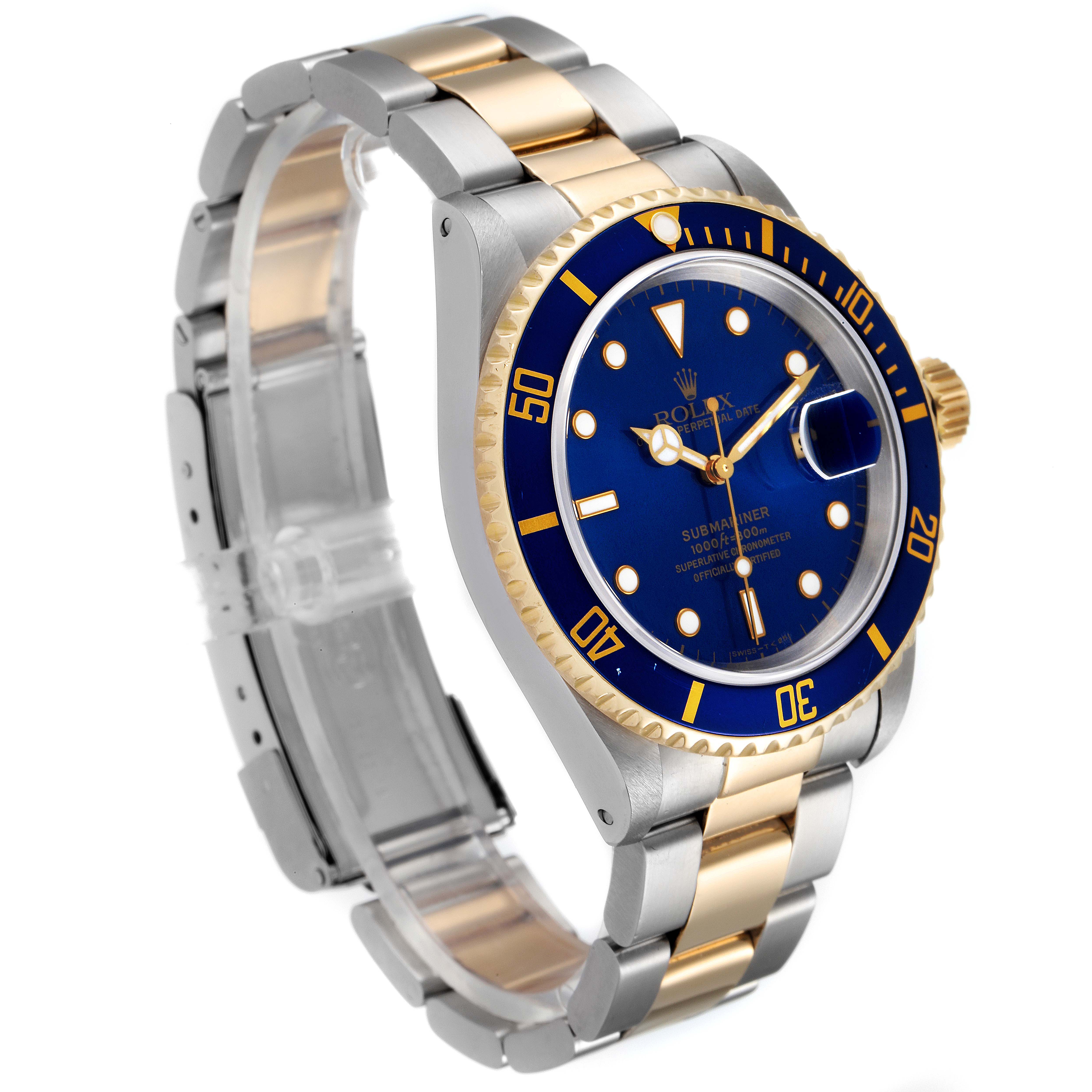 The image shows a Rolex Submariner 16613 Men's Steel and Gold (two tone) Blue Dial 16613 Men's Steel and Gold (two tone) Blue Dial watch at a three-quarter angle, highlighting the bezel, dial, bracelet, and clasp.