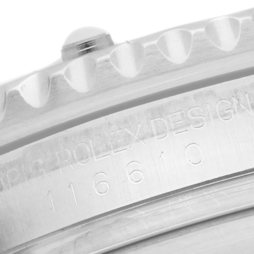 The image shows the side view of the bezel and case engravings of a Rolex Submariner model 116610 men's watch.