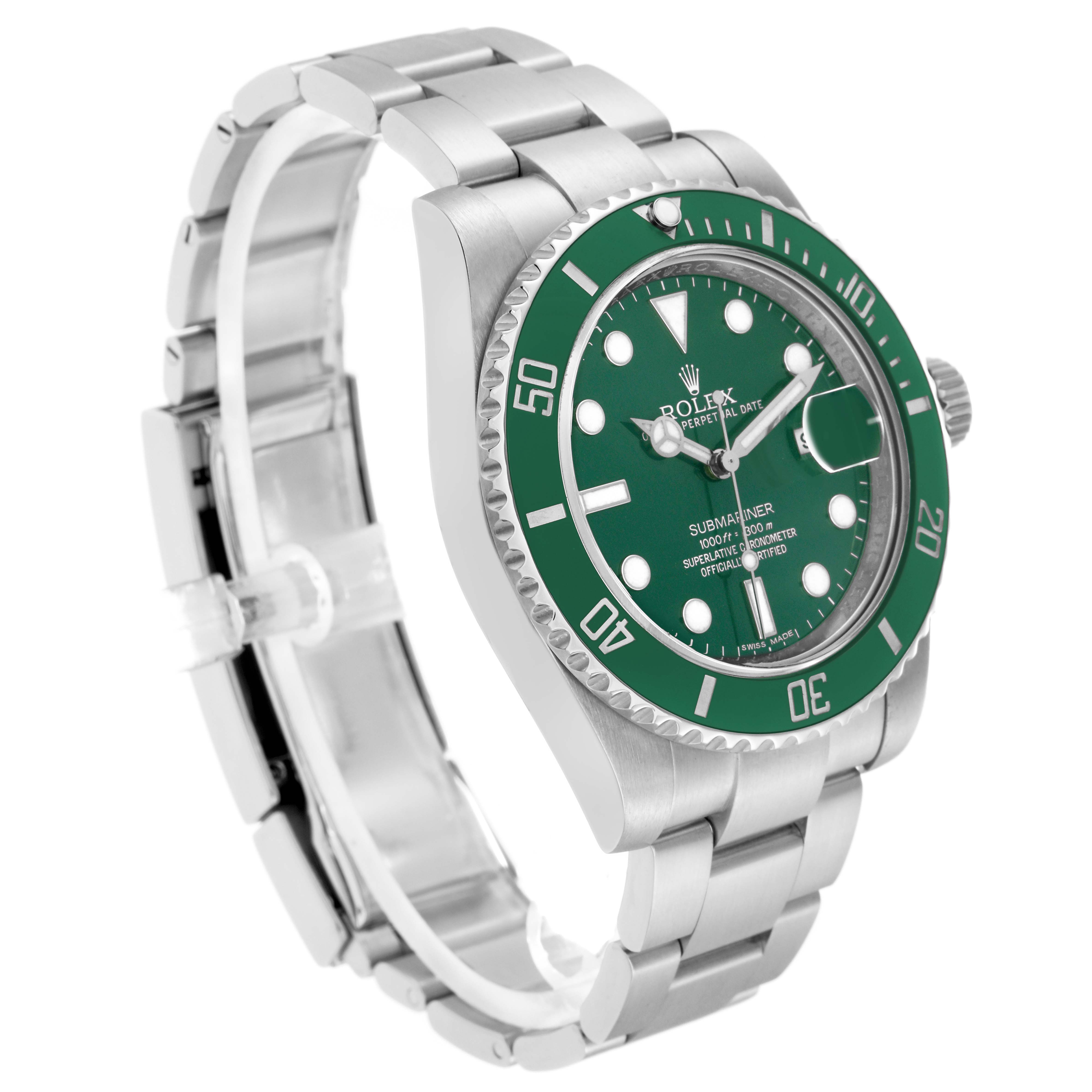 The image shows a Rolex Submariner model 116610 men's watch from a three-quarter angle, highlighting the green bezel, dial, and stainless steel bracelet.