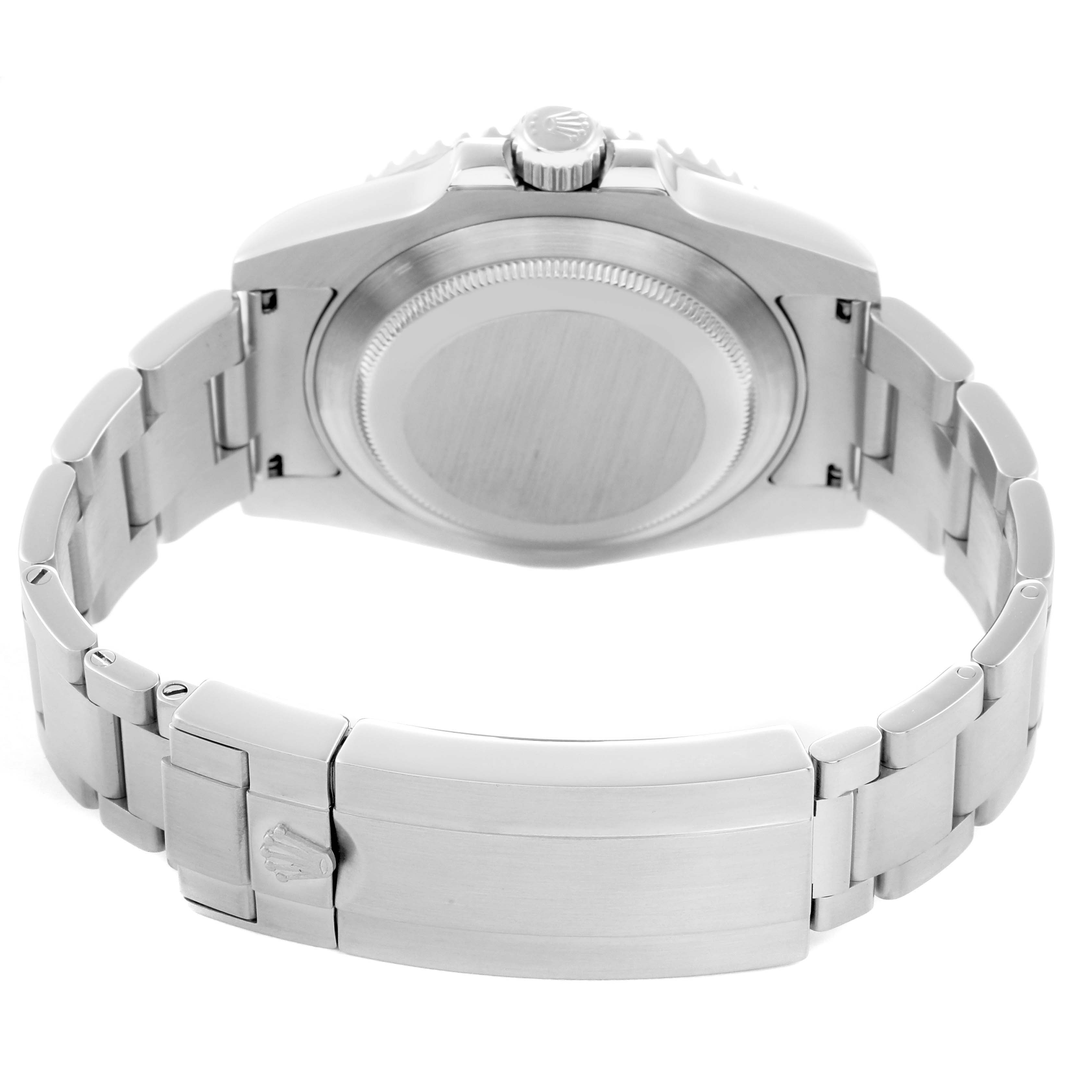 The image shows the back and bracelet of a Rolex Submariner, model 116610, featuring the closed clasp and visible case back.