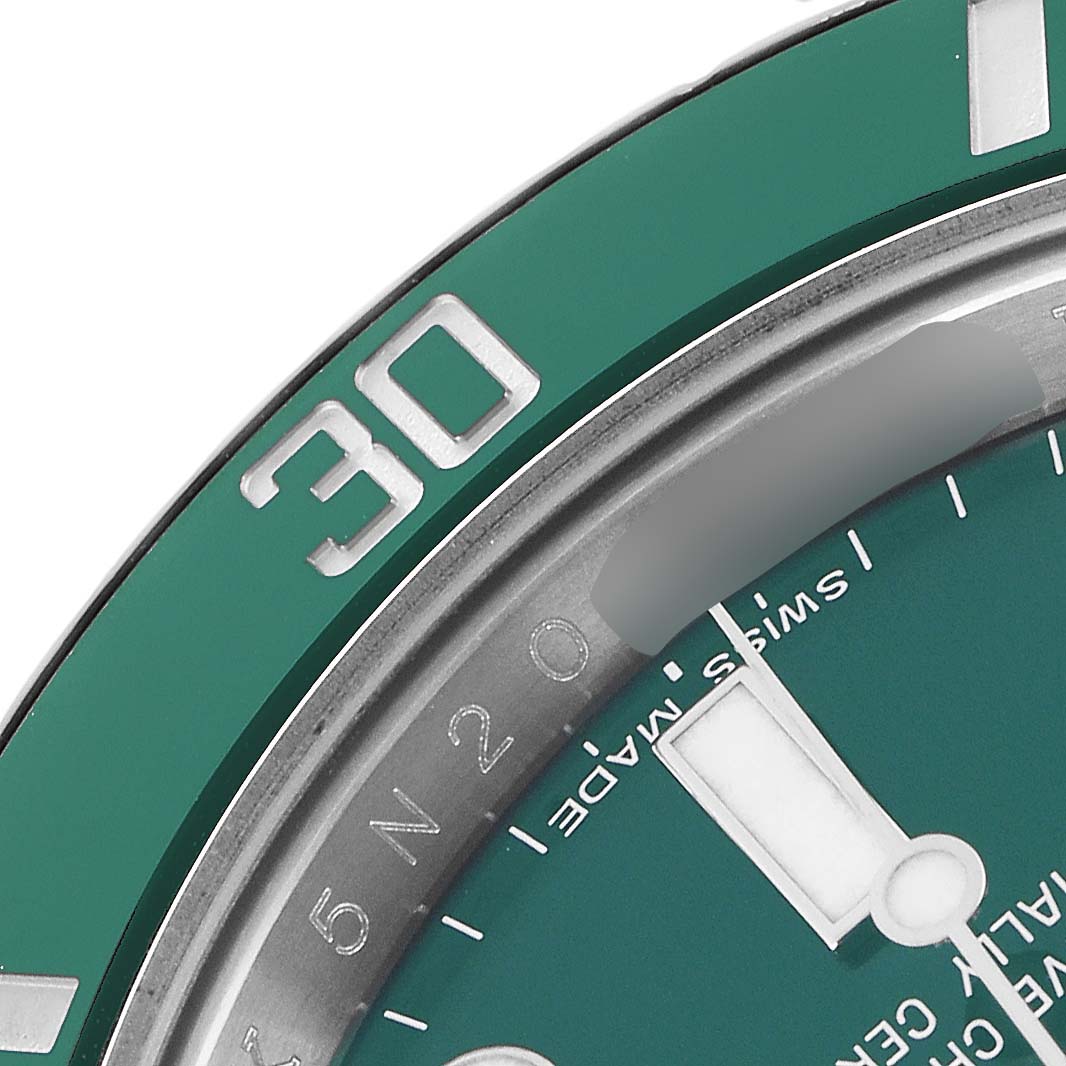 The image shows a close-up of the green bezel and part of the dial of a Rolex Submariner 116610LV men's watch, highlighting the "30" marker.