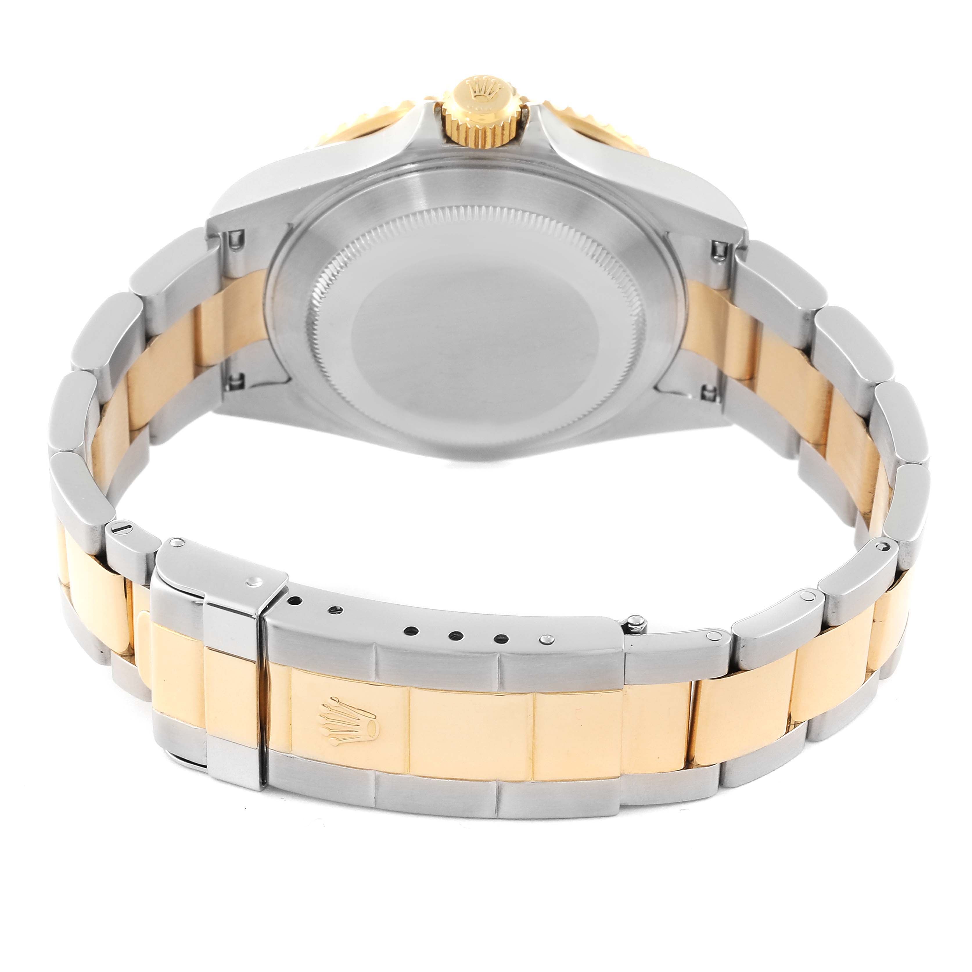 This image shows the back case and clasp of a Rolex Submariner 16613 Men's Steel and Gold (two tone) Black Dial 16613 Men's Steel and Gold (two tone) Black Dial watch, highlighting its two-tone metal bracelet.