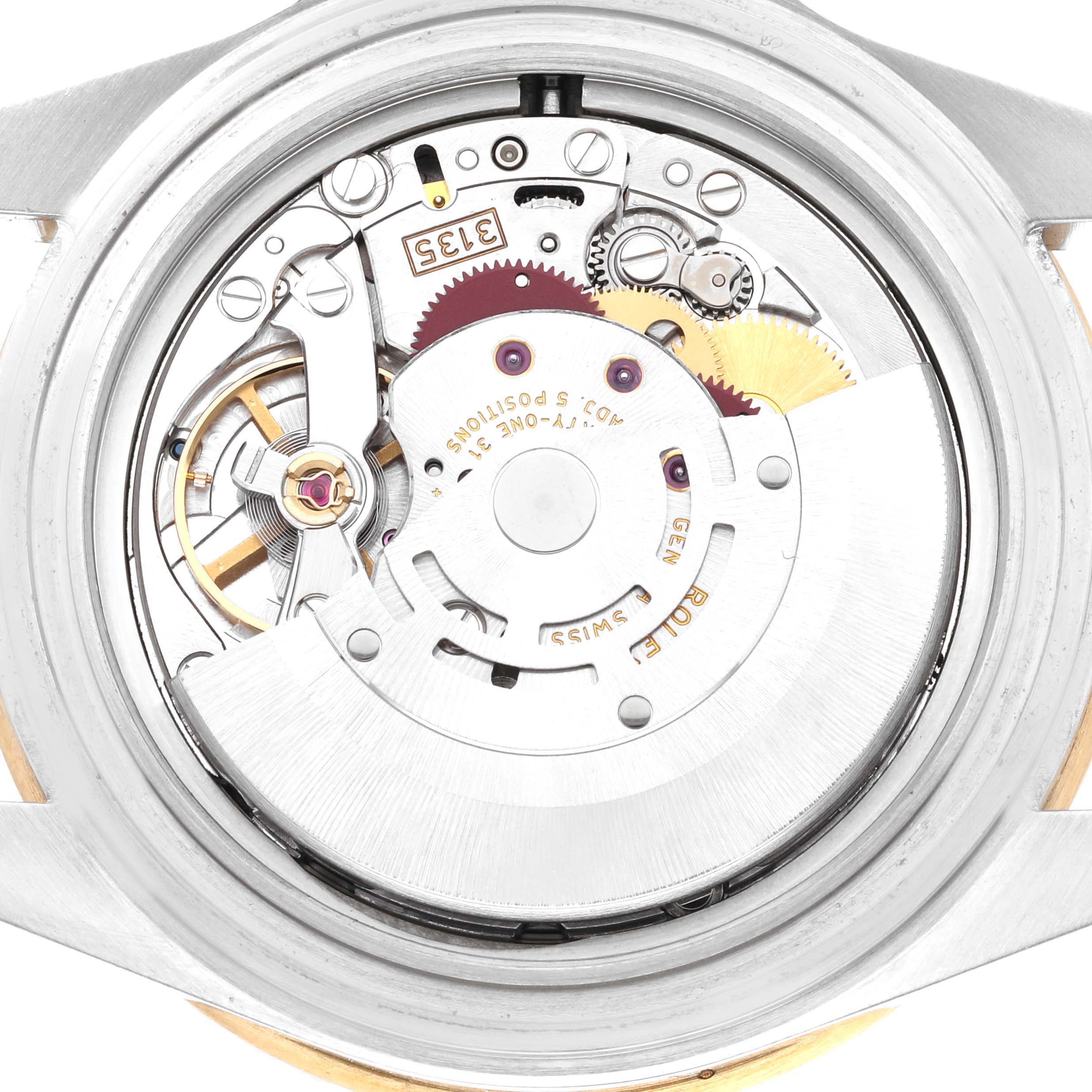 This image shows the internal mechanism and movement components of a Rolex Submariner 16613 Men's Steel and Gold (two tone) Black Dial 16613 Men's Steel and Gold (two tone) Black Dial watch, viewed from the back.