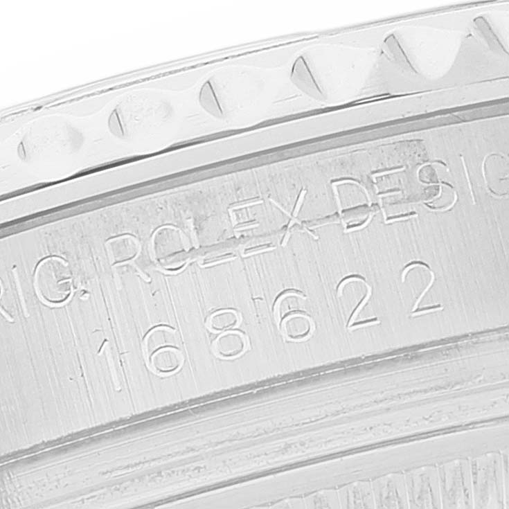 The image shows a close-up of the engraved case back and bezel of the Rolex Yacht-Master 168622 Men's Stainless Steel Silver Dial 168622 Men's Stainless Steel Silver Dial watch.