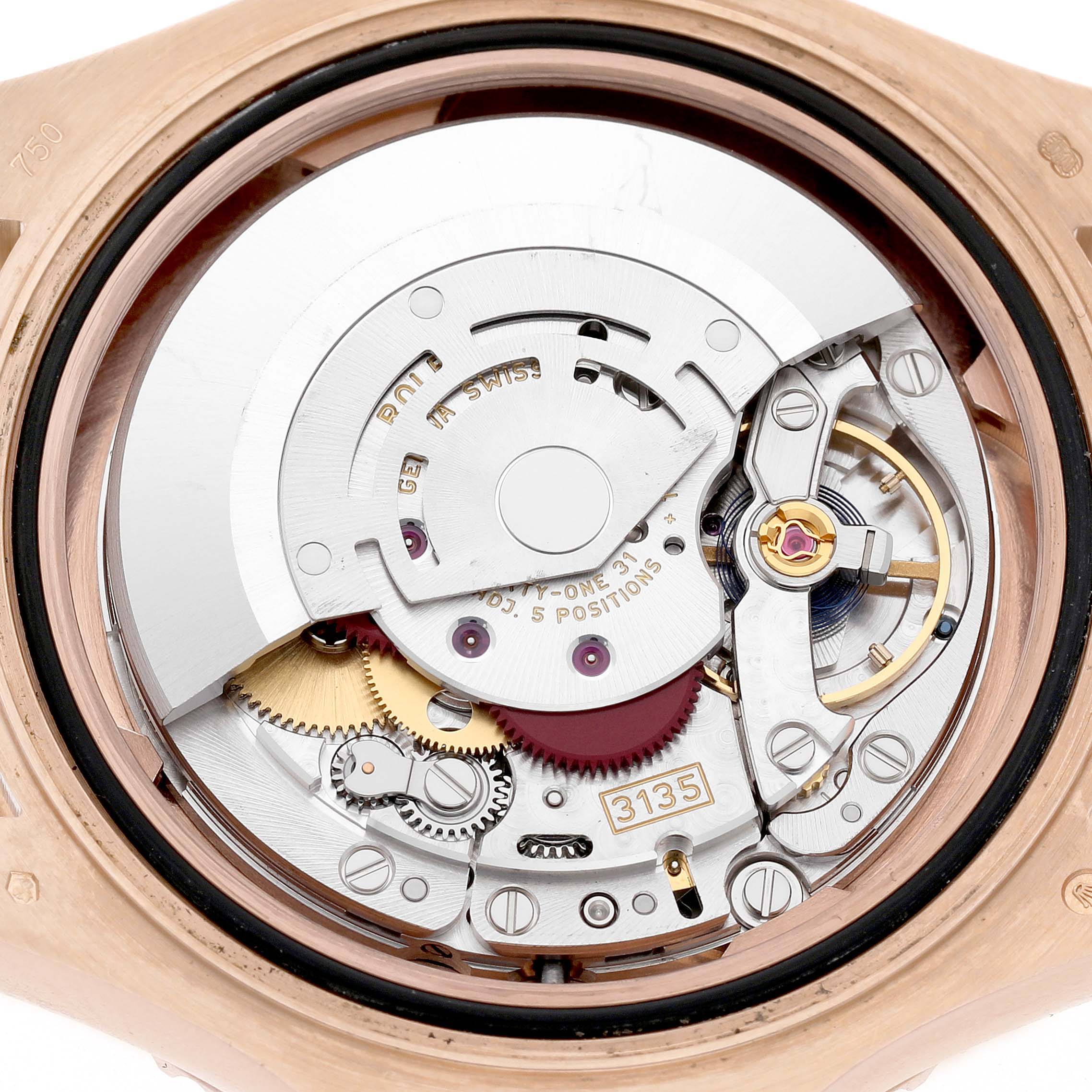 The Rolex Yacht-Master 116655 Men's Rose Gold Black Dial is shown from the back, highlighting its intricate movement and internal components.