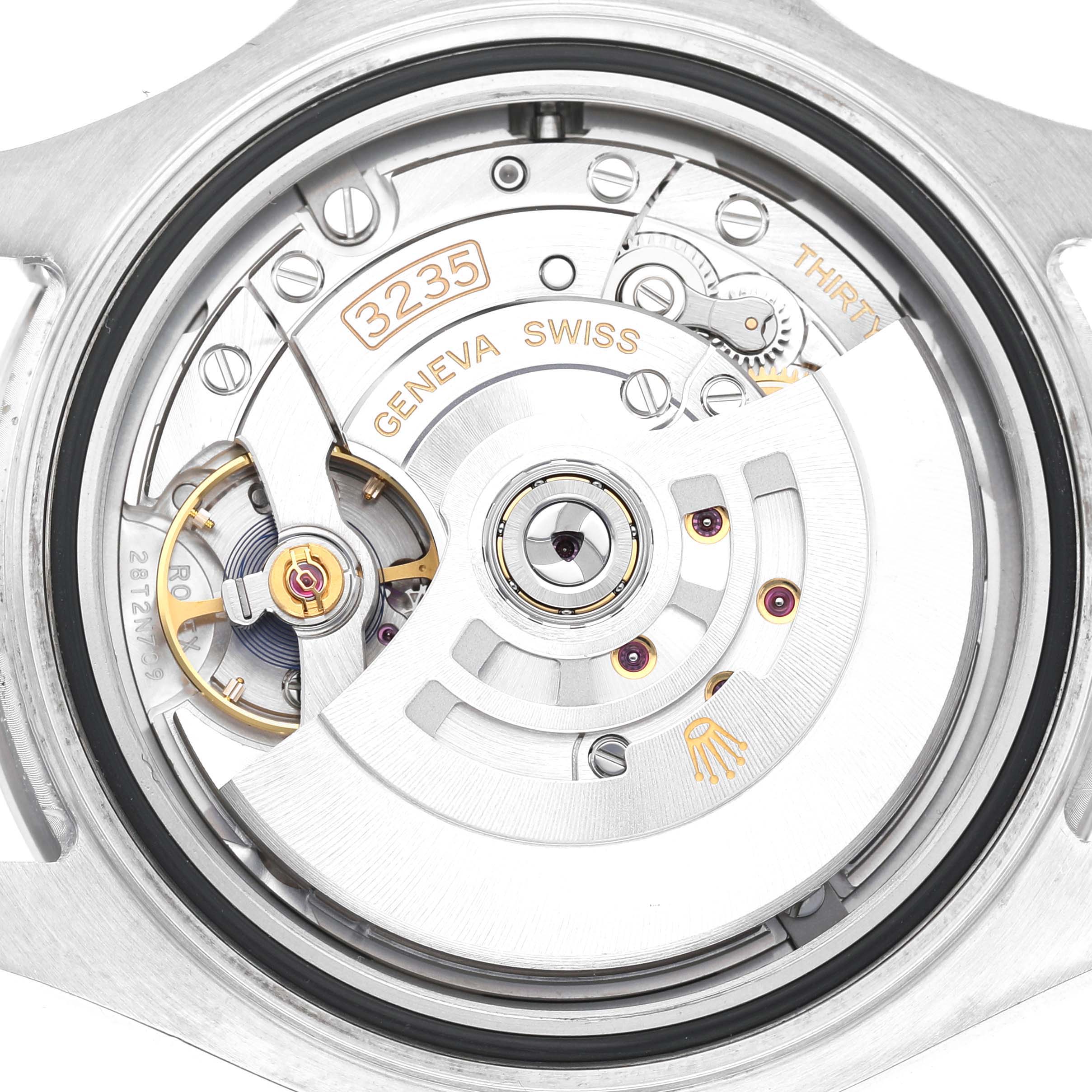 The image shows the movement of a Rolex Yacht-Master 116622 Men's Stainless Steel Grey Dial watch, with visible gears and the "3235" marking.