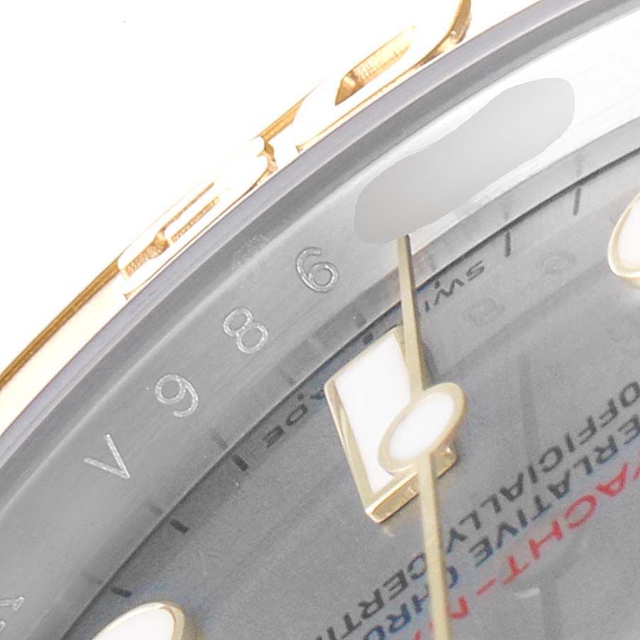 The image shows a close-up angle of the Yacht-Master model by Rolex, focusing on the dial, indices, and part of the bezel.