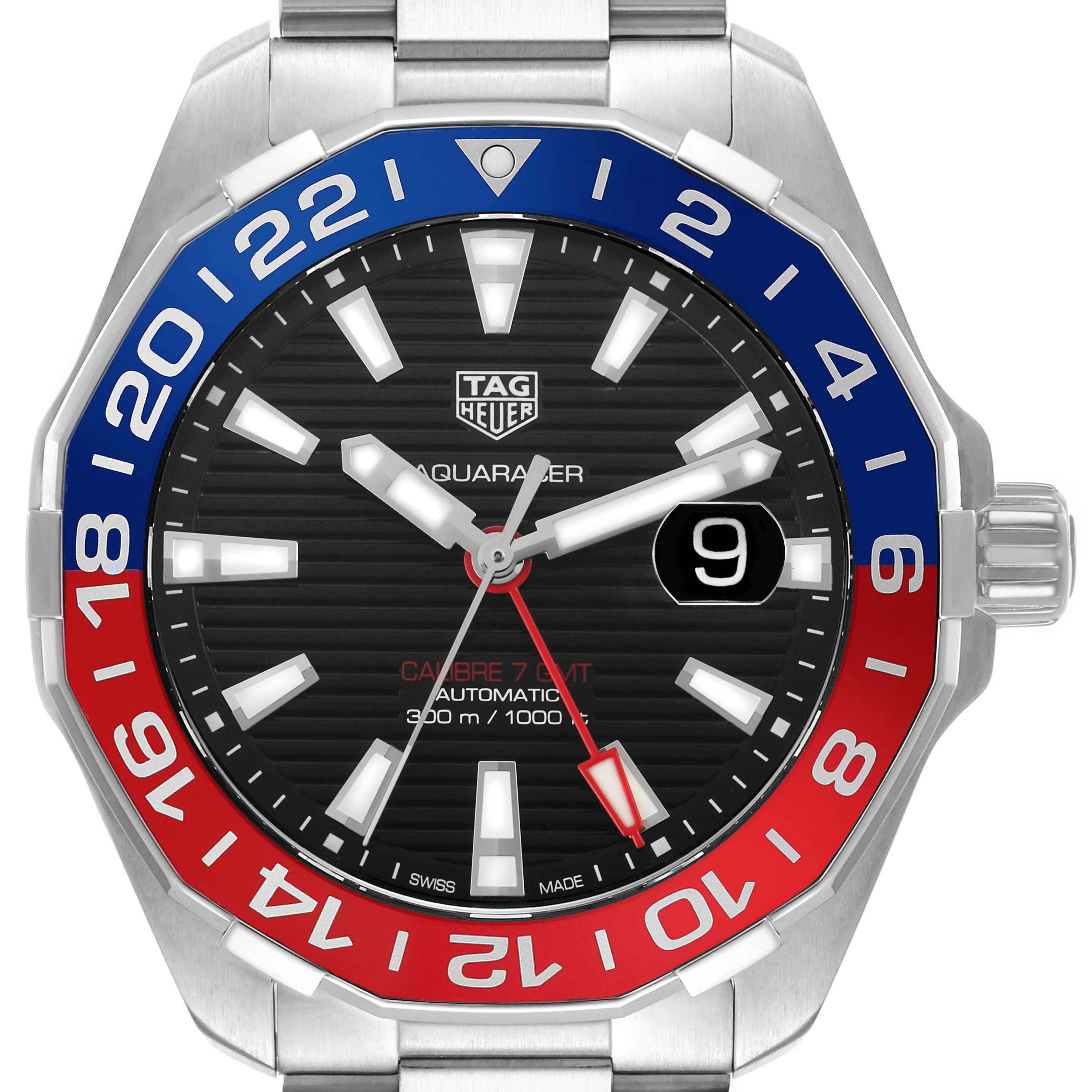 The TAG Heuer Aquaracer watch is shown from a front angle, highlighting its bezel, dial, hands, and date window.