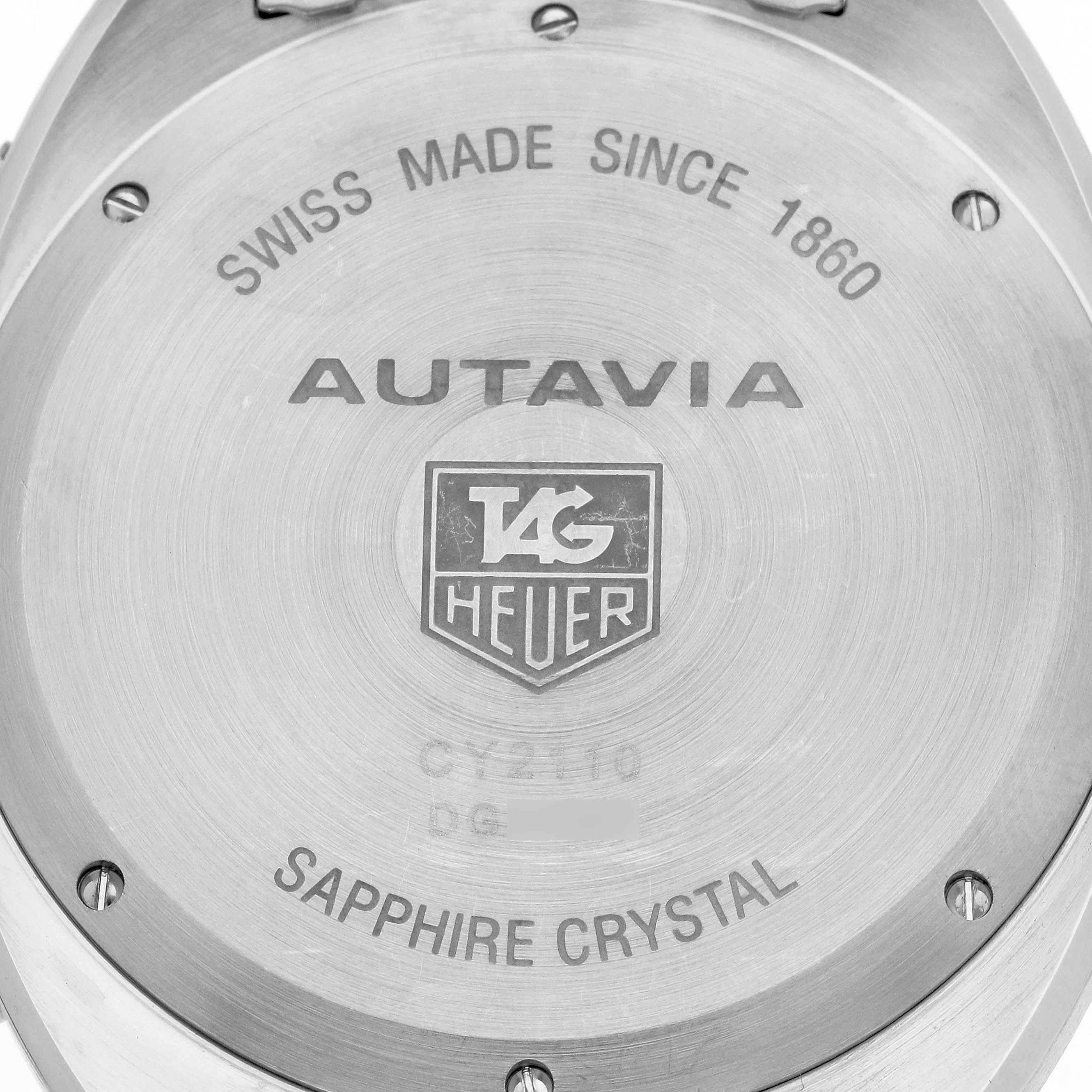 The image shows the back case of a Tag Heuer Autavia CY2110 Men's Stainless Steel White Dial CY2110 Men's Stainless Steel White Dial watch, highlighting the brand, model name, and construction details.