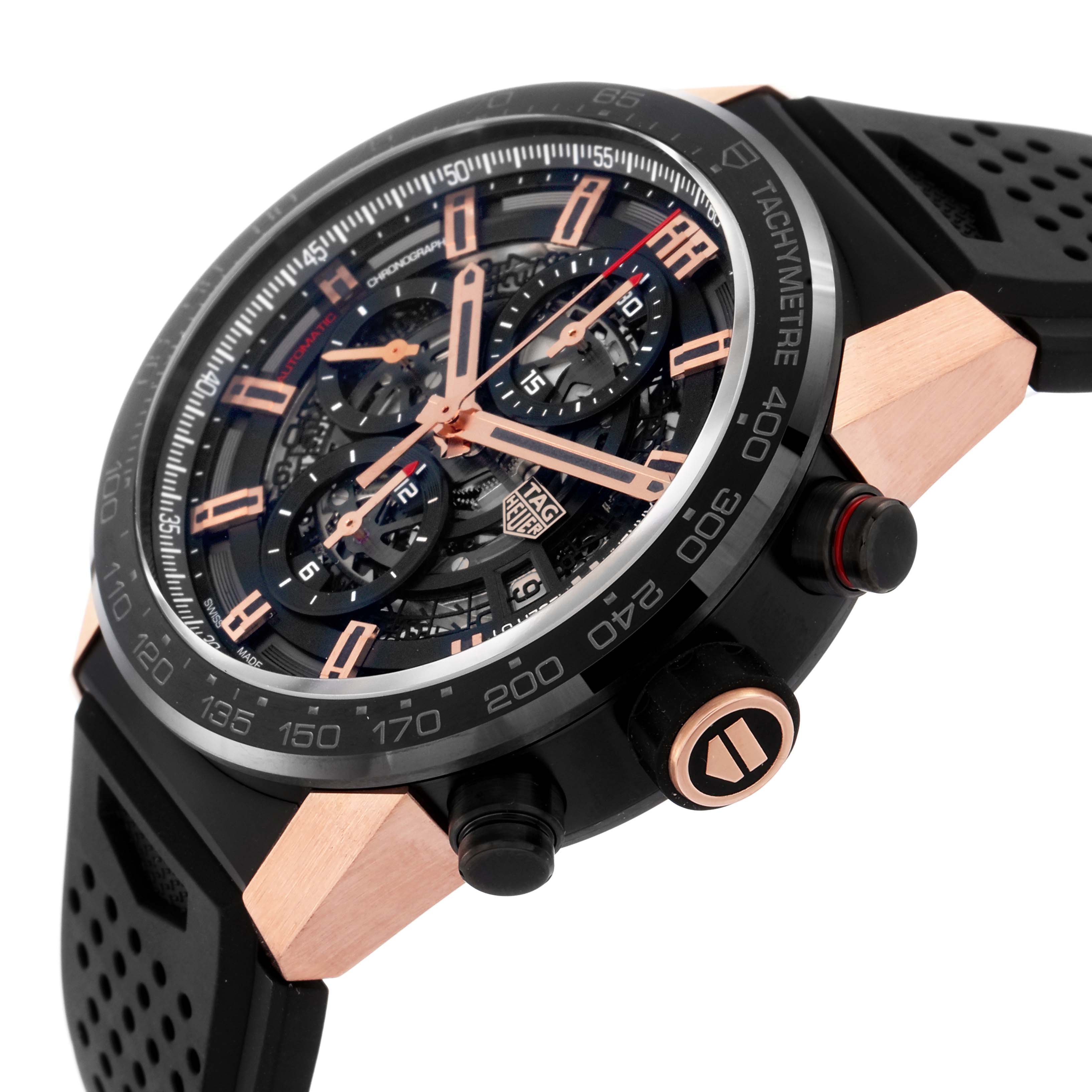 The Tag Heuer Carrera model CAR205A.FT6087 is shown at an angle highlighting the watch face, bezel with tachymeter scale, pushers, and part of the strap.
