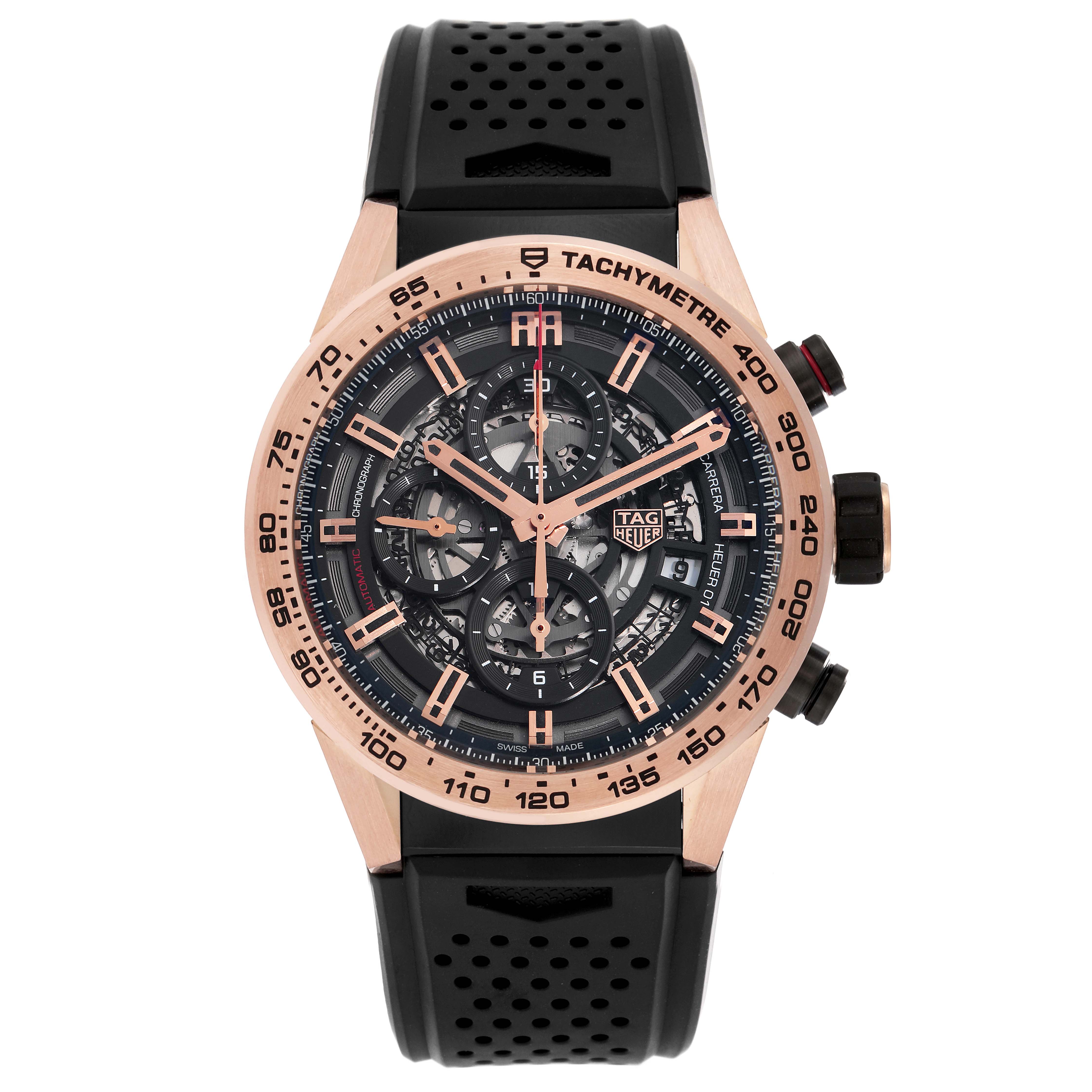 The Tag Heuer Carrera model CAR205B men's watch is shown from a front angle displaying its face, chronographs, tachymeter bezel, and perforated rubber strap.