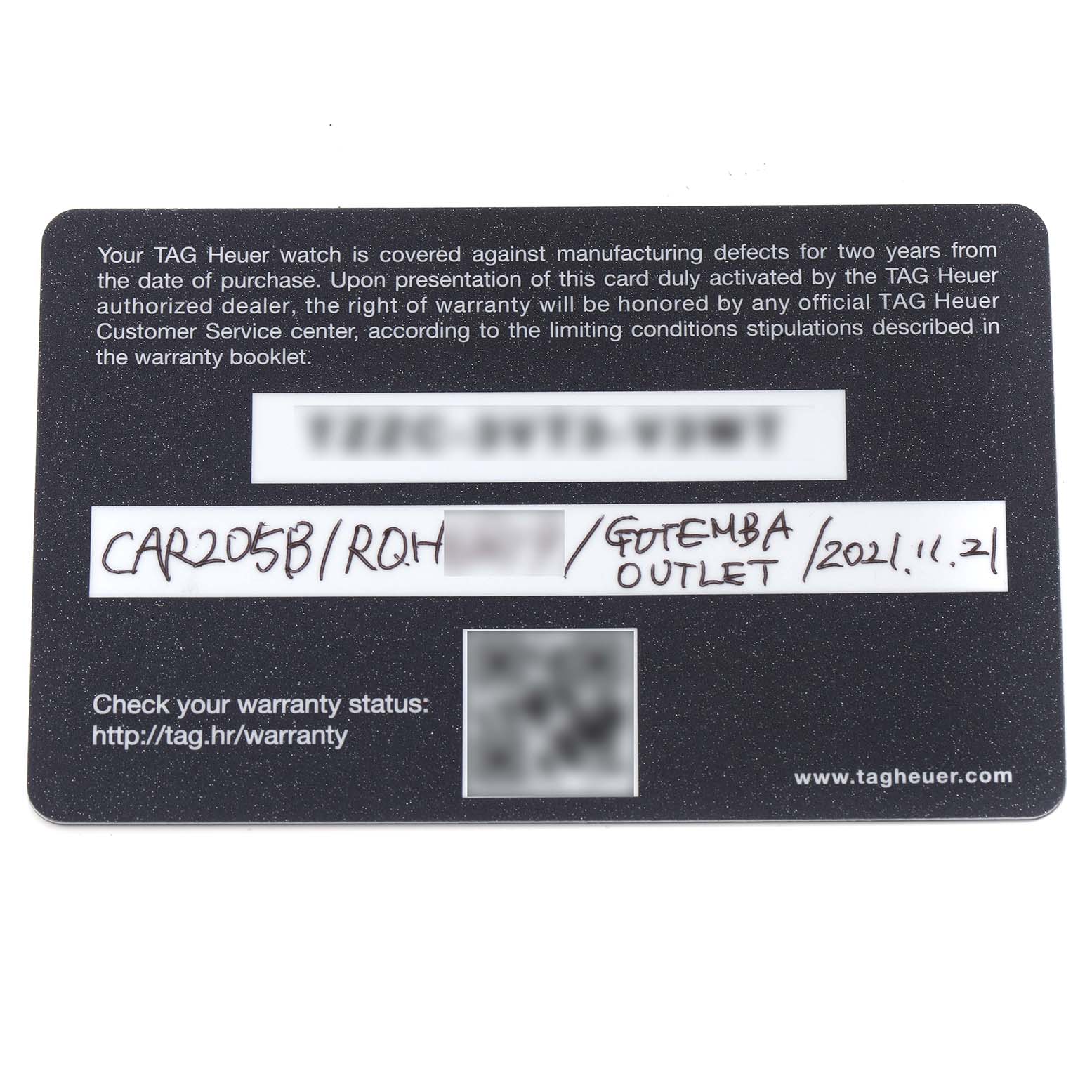 The image shows a warranty card for the Tag Heuer Carrera men's watch, model number CAR205B.