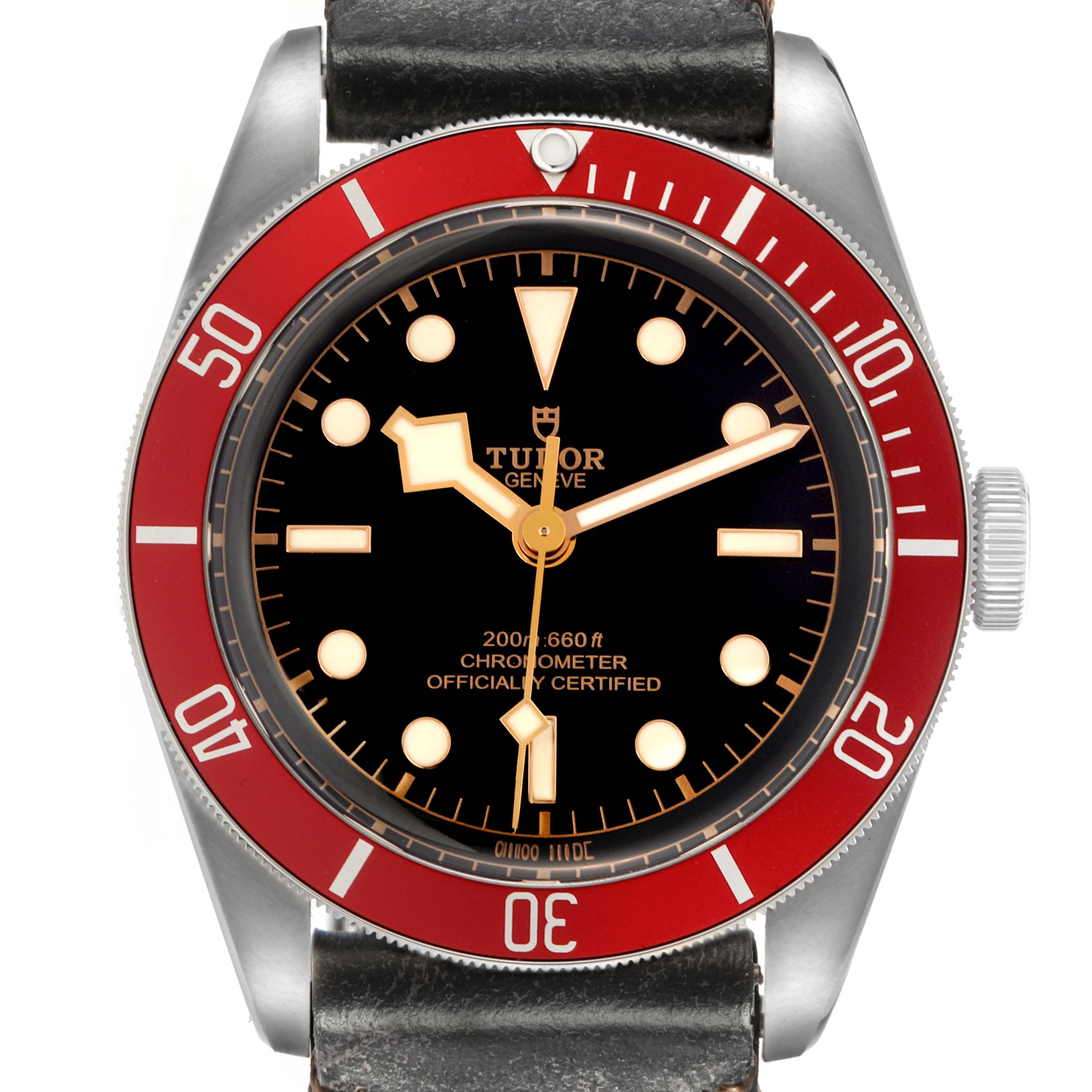 The Tudor Heritage Black Bay model 79230R is shown from the front, featuring its red bezel, black dial, luminescent markers, and leather strap.