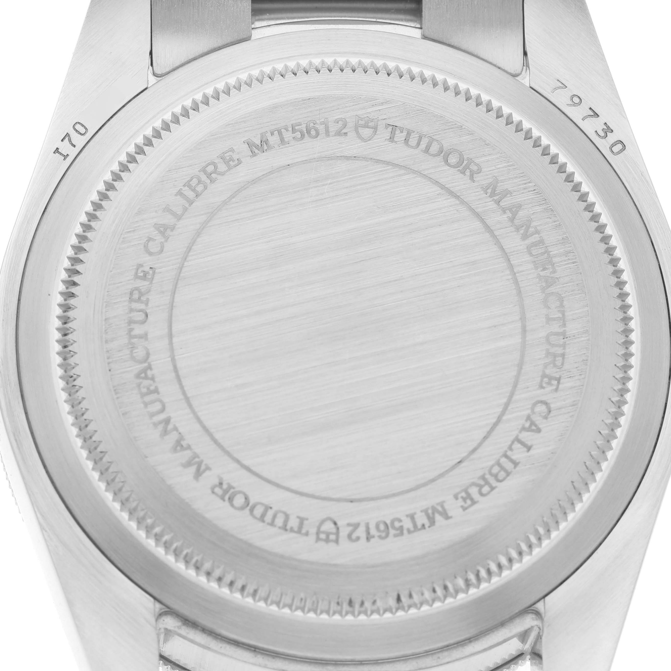 The image shows the back view of the Tudor Heritage Black Bay M79730-003 Men's Stainless Steel Black Dial, highlighting the caseback details and engravings.