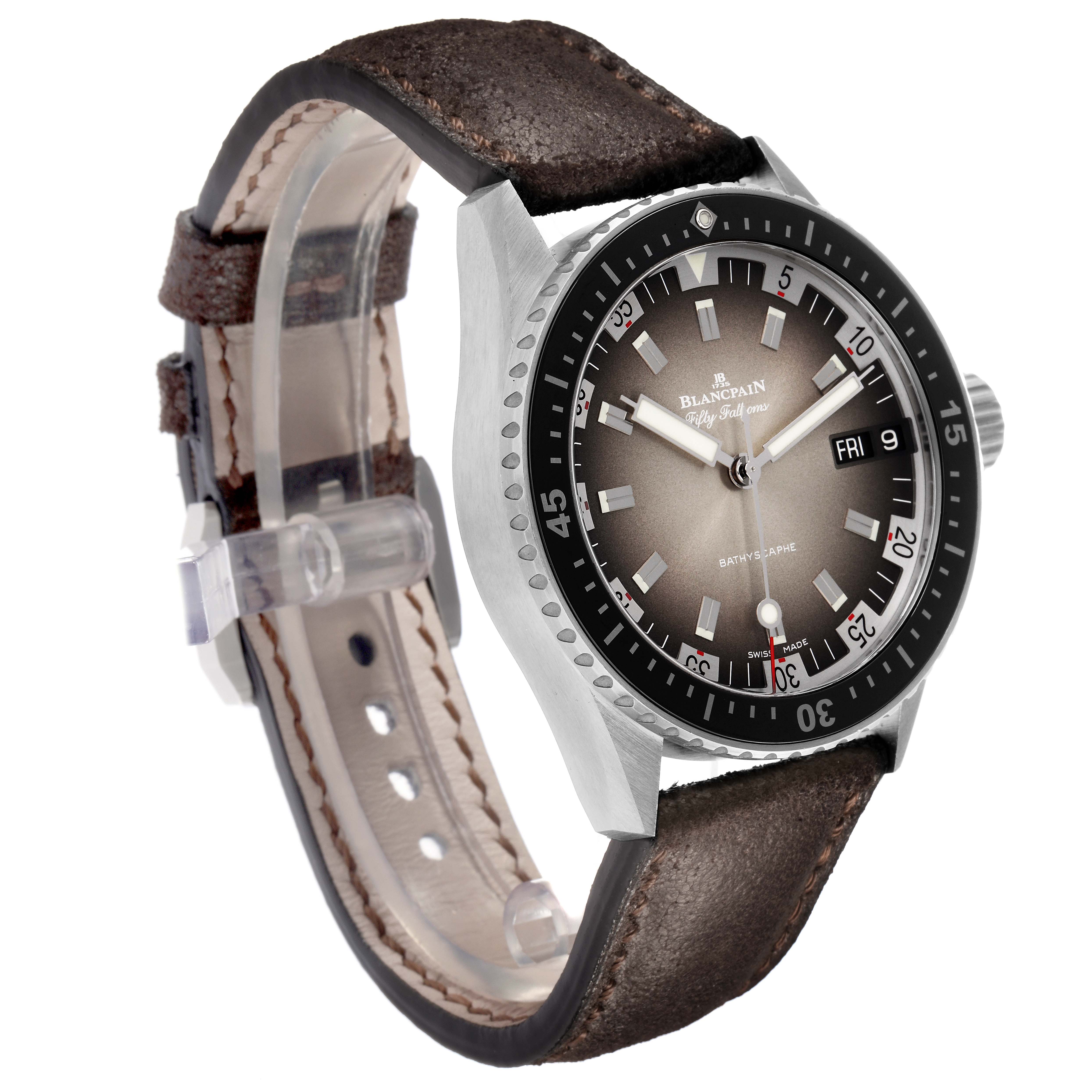 The Blancpain Fifty Fathoms model 5052-1110-63A watch is angled to show the watch face, bezel, case, and brown leather strap.