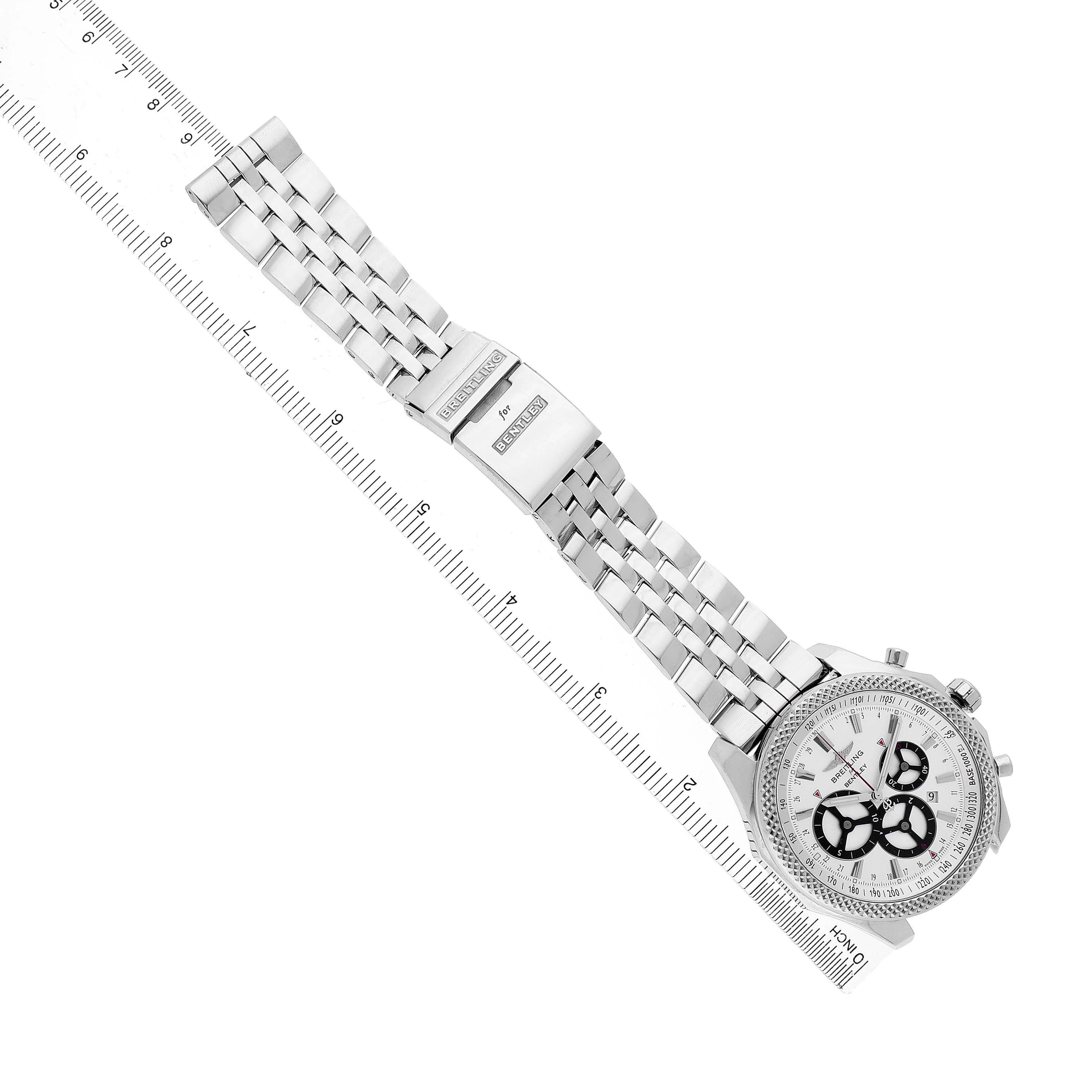The Breitling Bentley A25366 / A259G32FL Men's Stainless Steel Silver Dial watch is shown from an overhead angle, displaying the full face, bracelet, and clasp.
