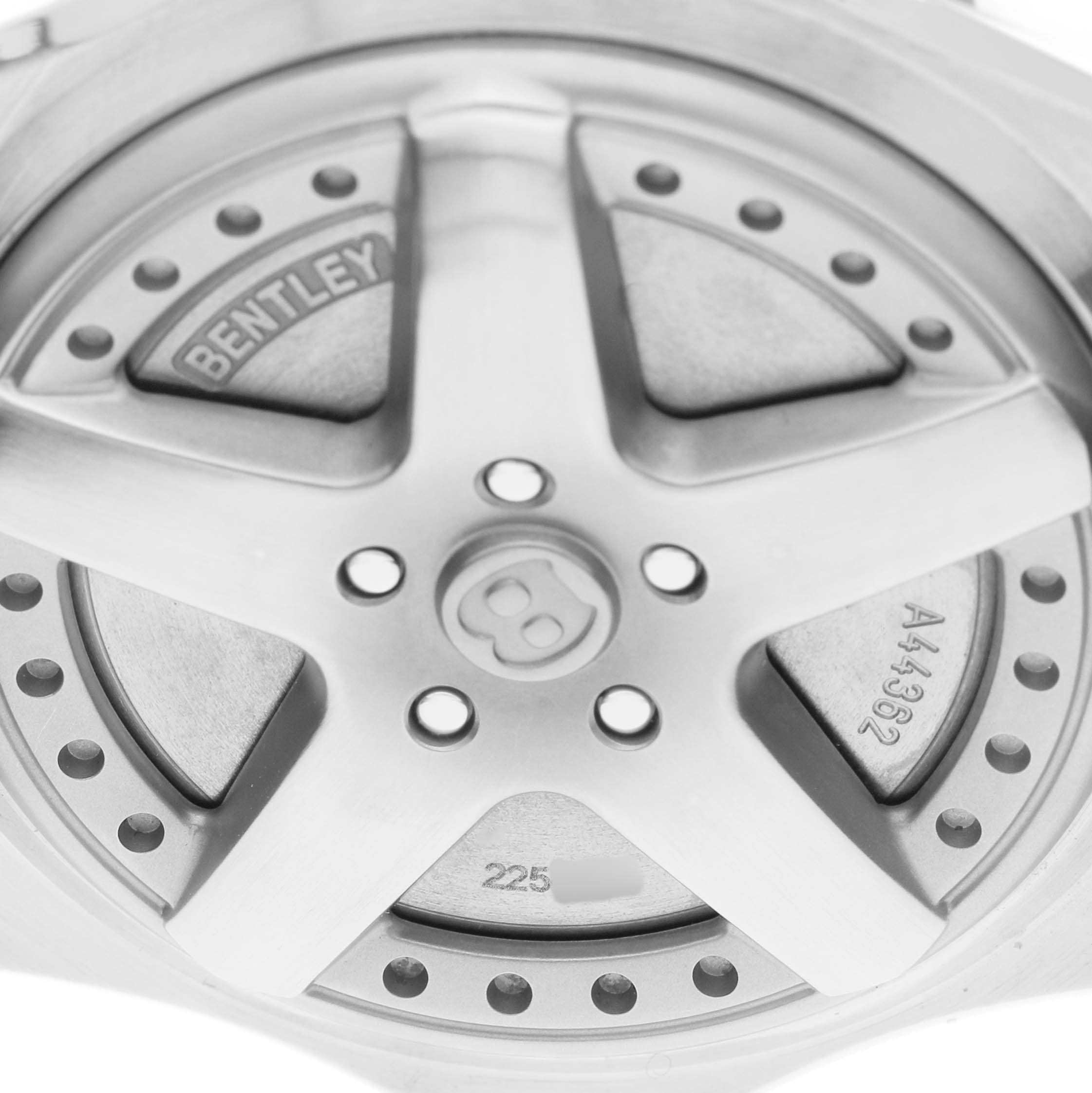 The image shows the back of the Breitling Bentley A44362 Men's Stainless Steel Blue Dial model, featuring a wheel-inspired design with branding details.