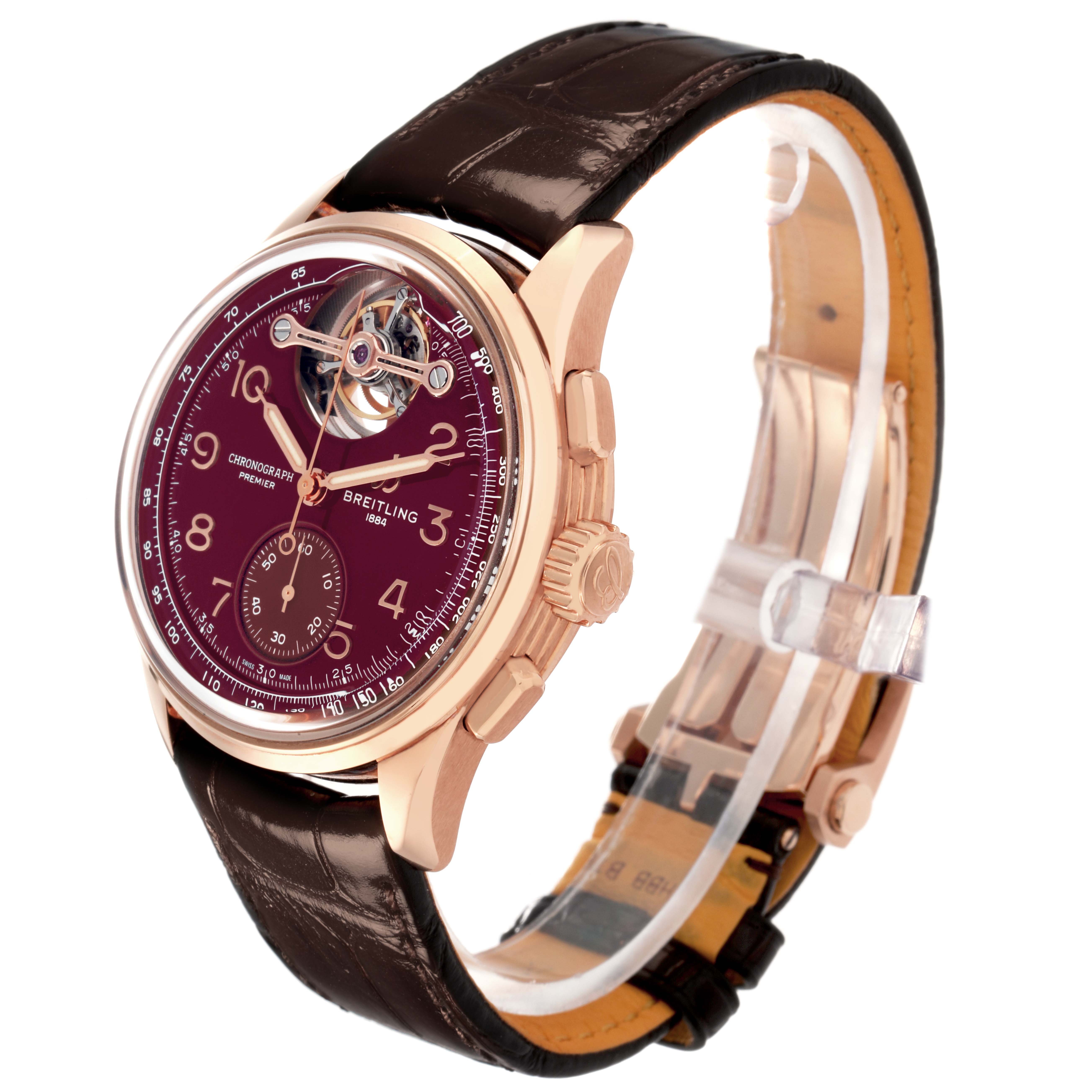 The Breitling Premier model RB21202A1K1P1 watch is shown at an angled side view, displaying the face, crown, leather strap, and part of the clasp.