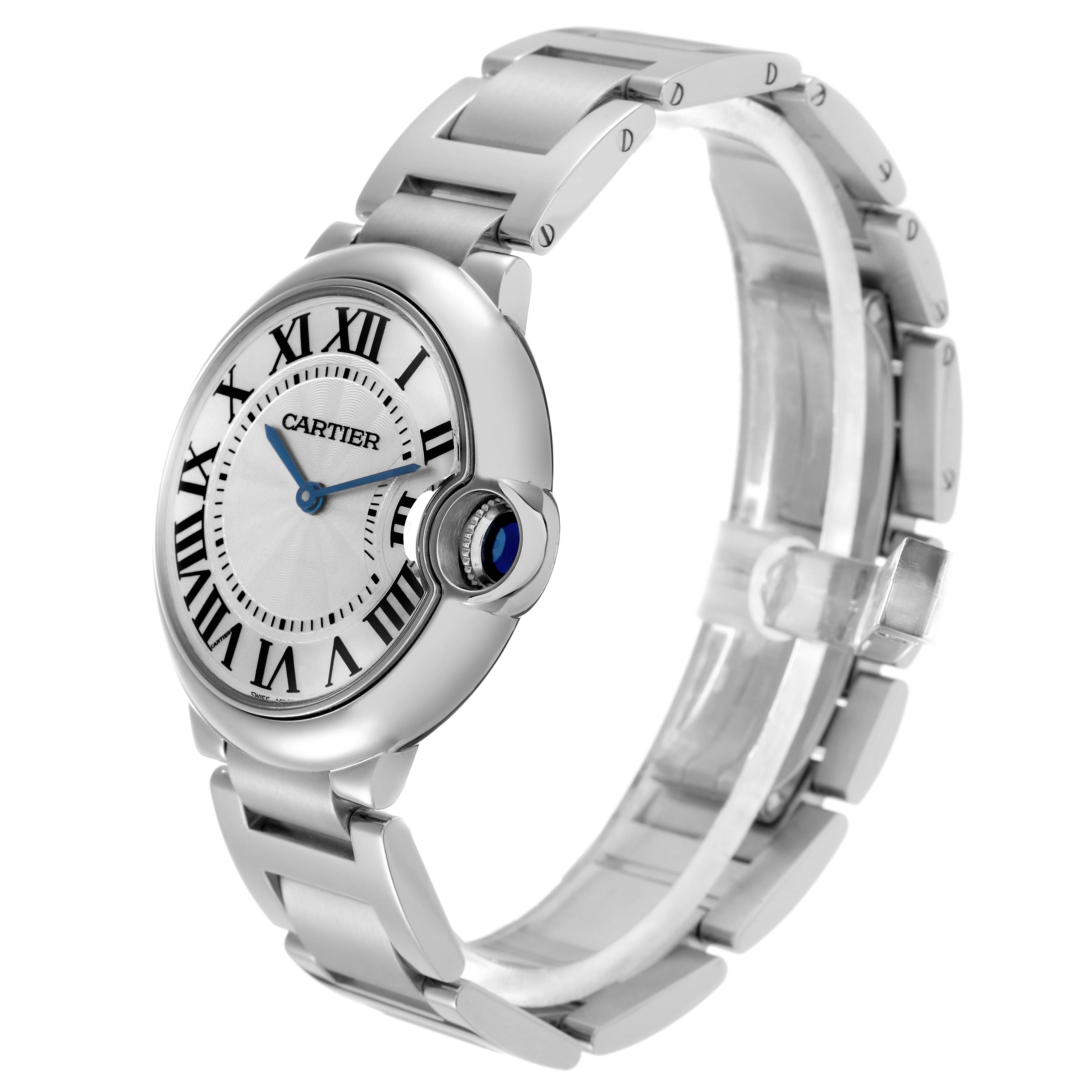 The Cartier Ballon Bleu W69011Z4 watch is shown at a three-quarter angle, highlighting the dial, Roman numerals, blue hands, and metal bracelet.
