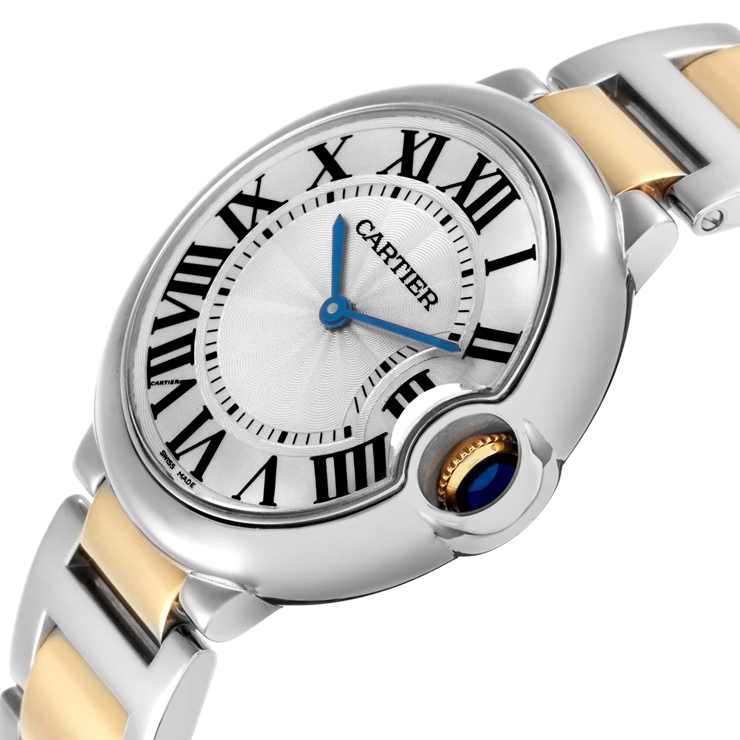 The Cartier Ballon Bleu W69008Z3 men's watch is shown at an angled side view, highlighting the face, Roman numerals, blue hands, and part of the bracelet.