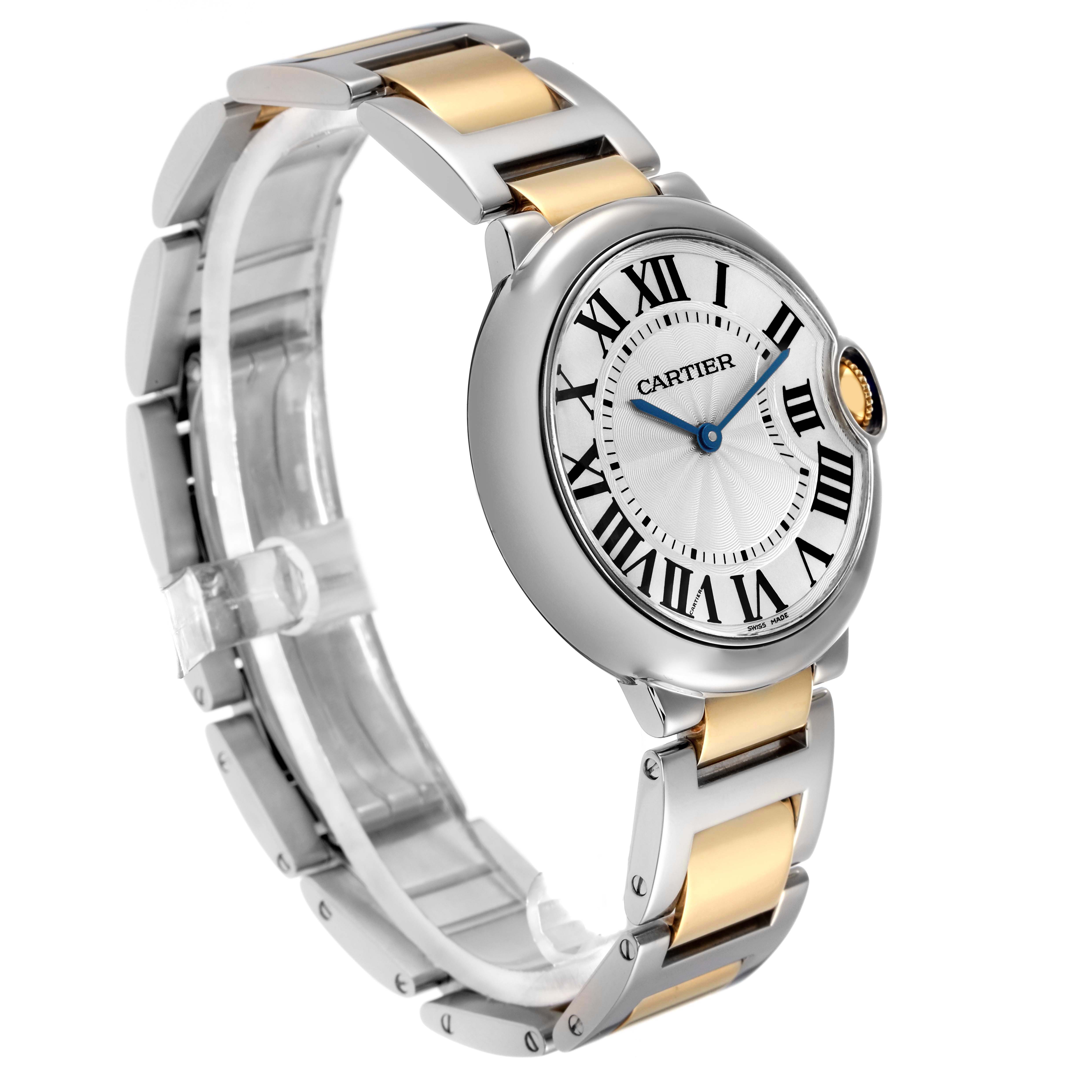 The image shows a Cartier Ballon Bleu model (W69008Z3) men's watch at a slight side angle, highlighting its silver and gold bracelet and the textured dial with Roman numerals.