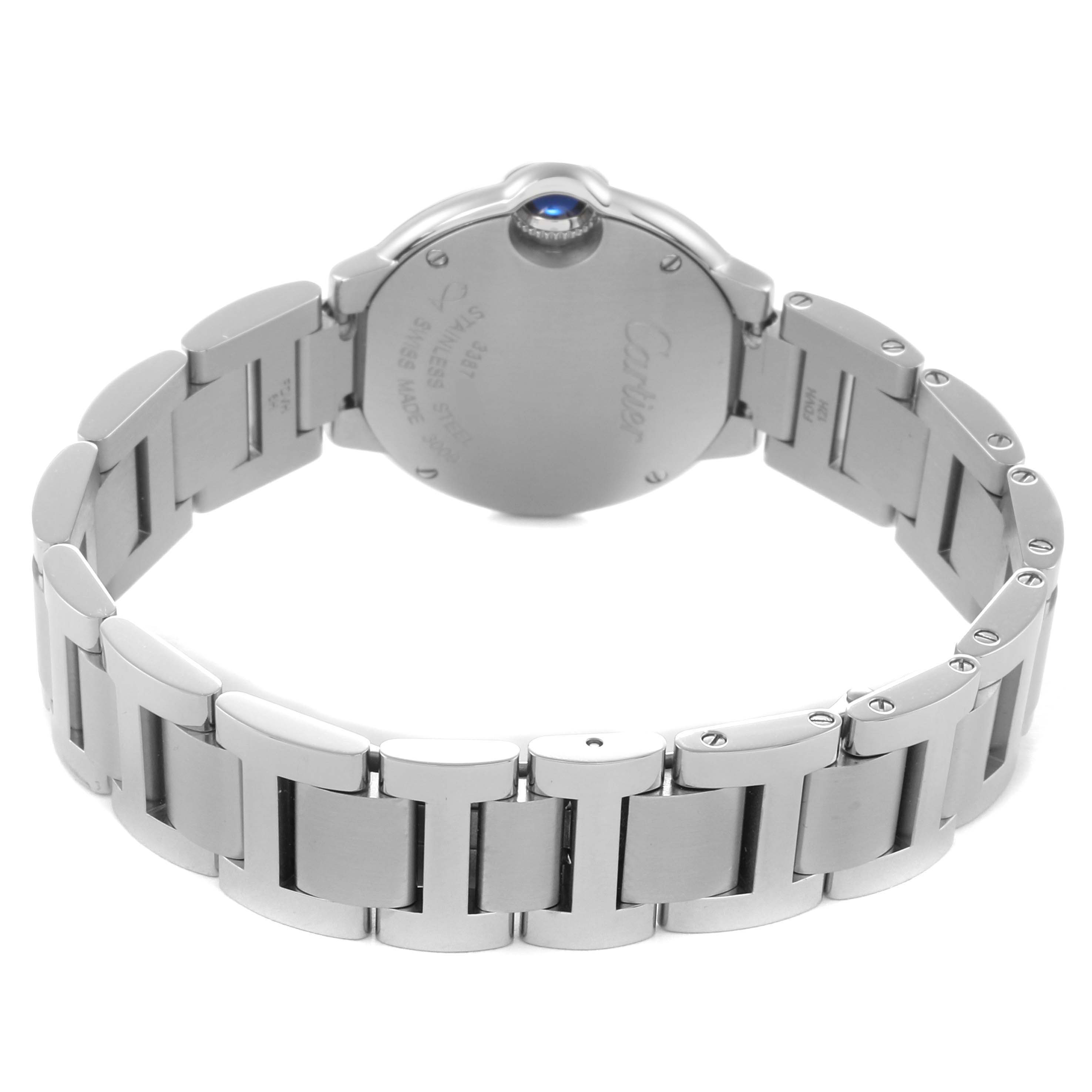 The image shows the back and bracelet of a Cartier Ballon Bleu men's watch, model W6920038, highlighting the metallic links and case back with a glimpse of the crown.