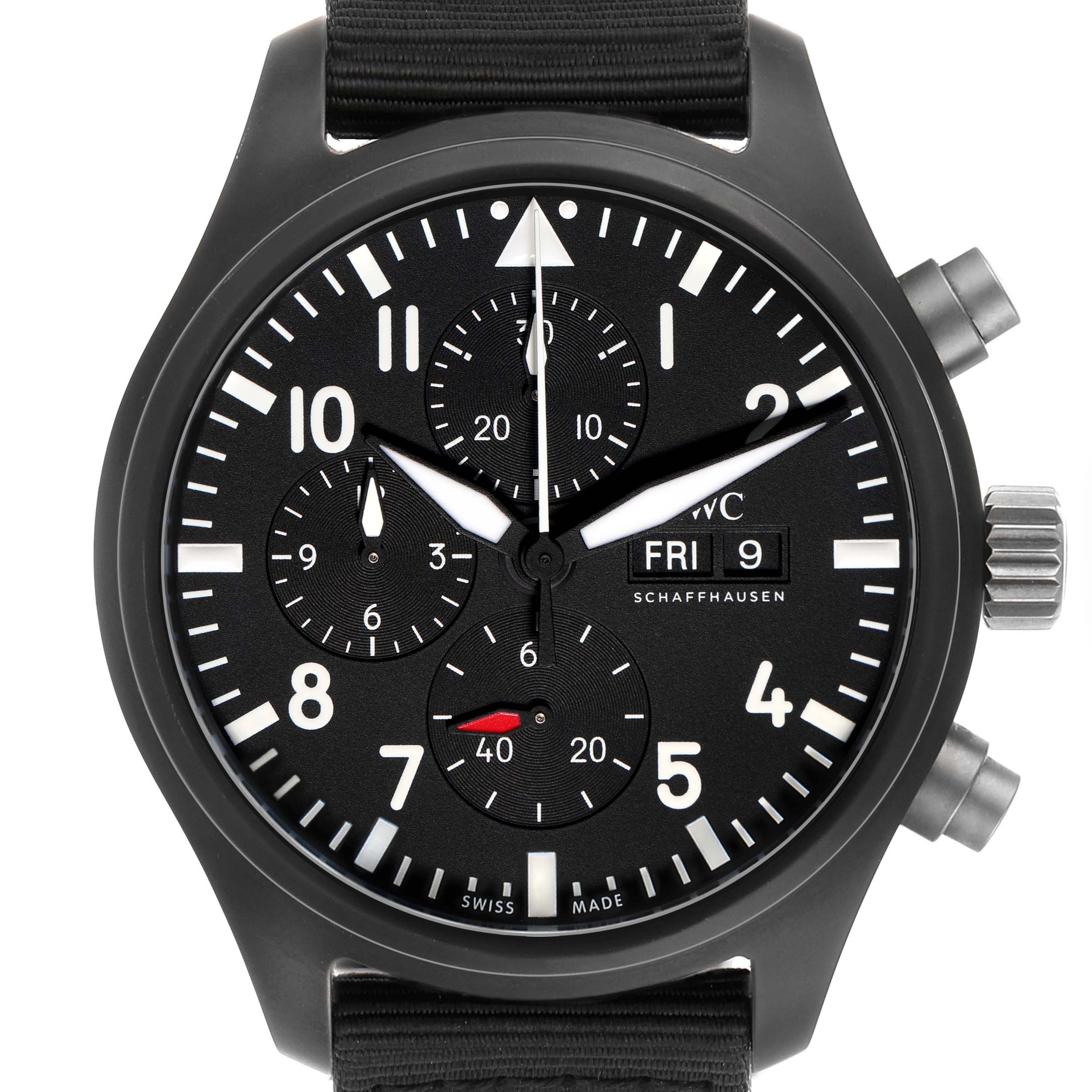 The IWC Pilot model IW389101 men's watch is shown from the front, displaying the dial with three subdials, day-date window, and chronograph pushers.