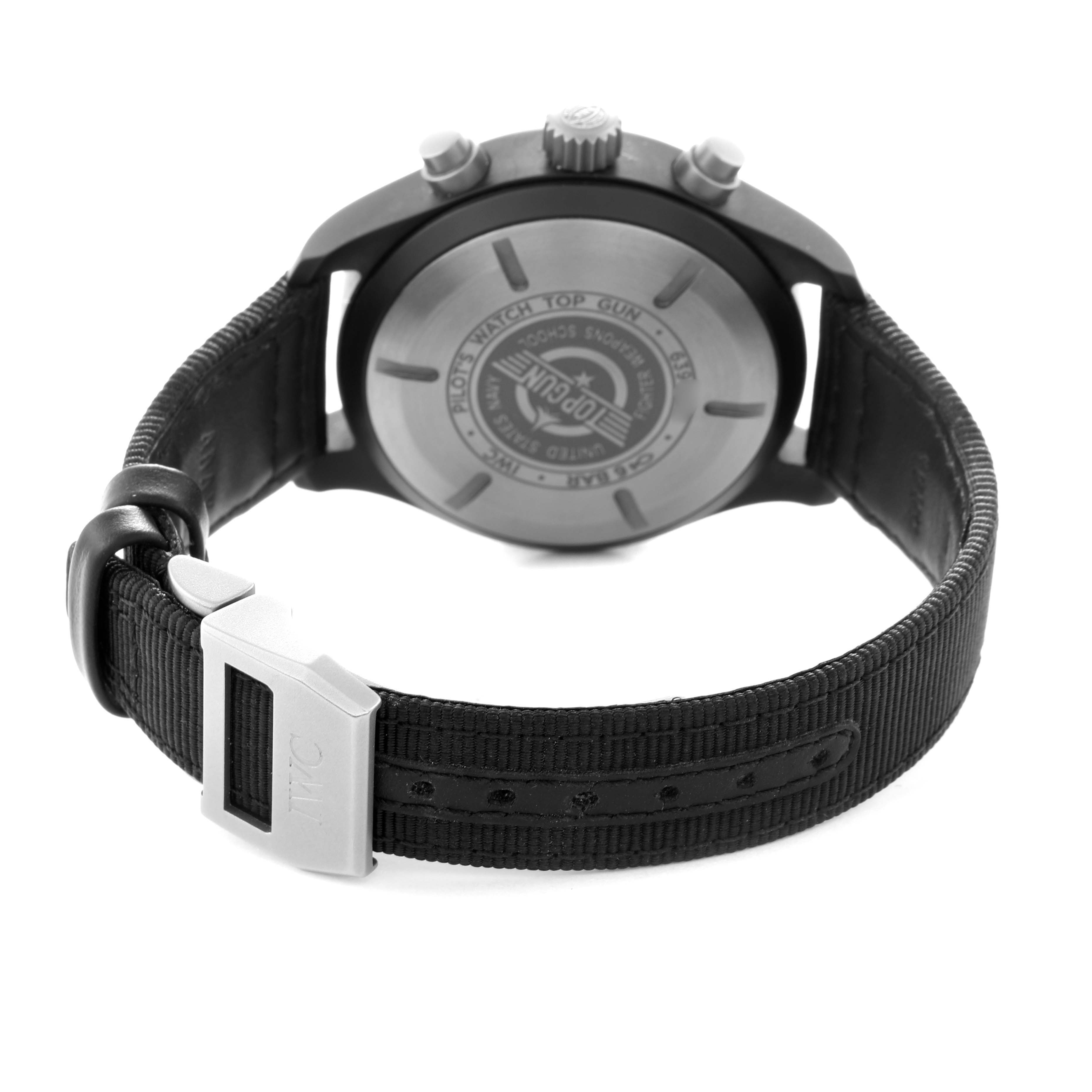 The image shows the back of the IWC Pilot Men’s watch, model IW389101, highlighting the case back, crown, and strap with the IWC logo on the clasp.