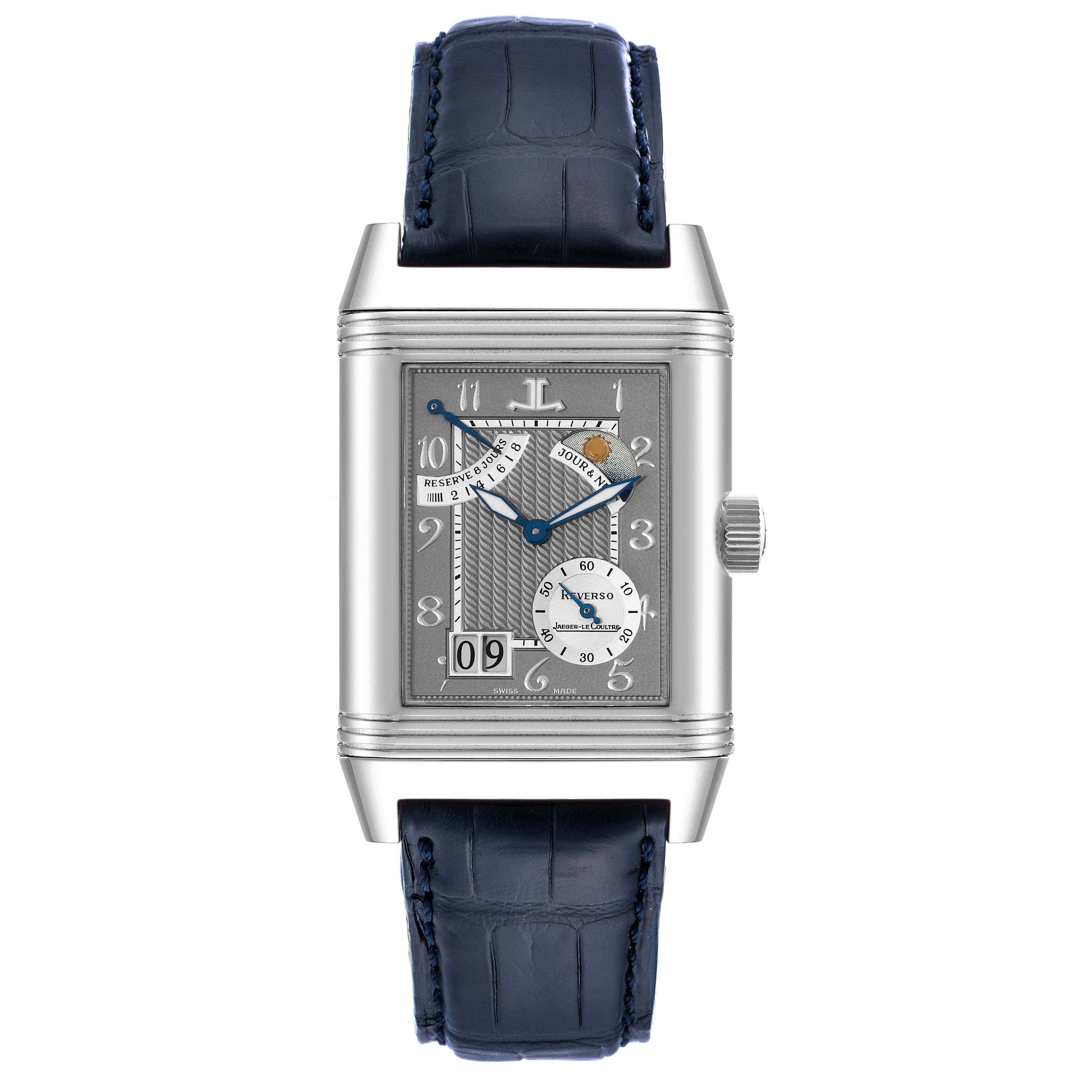 The image shows a frontal view of the Jaeger-LeCoultre Reverso watch with a blue leather strap and a detailed silver dial.