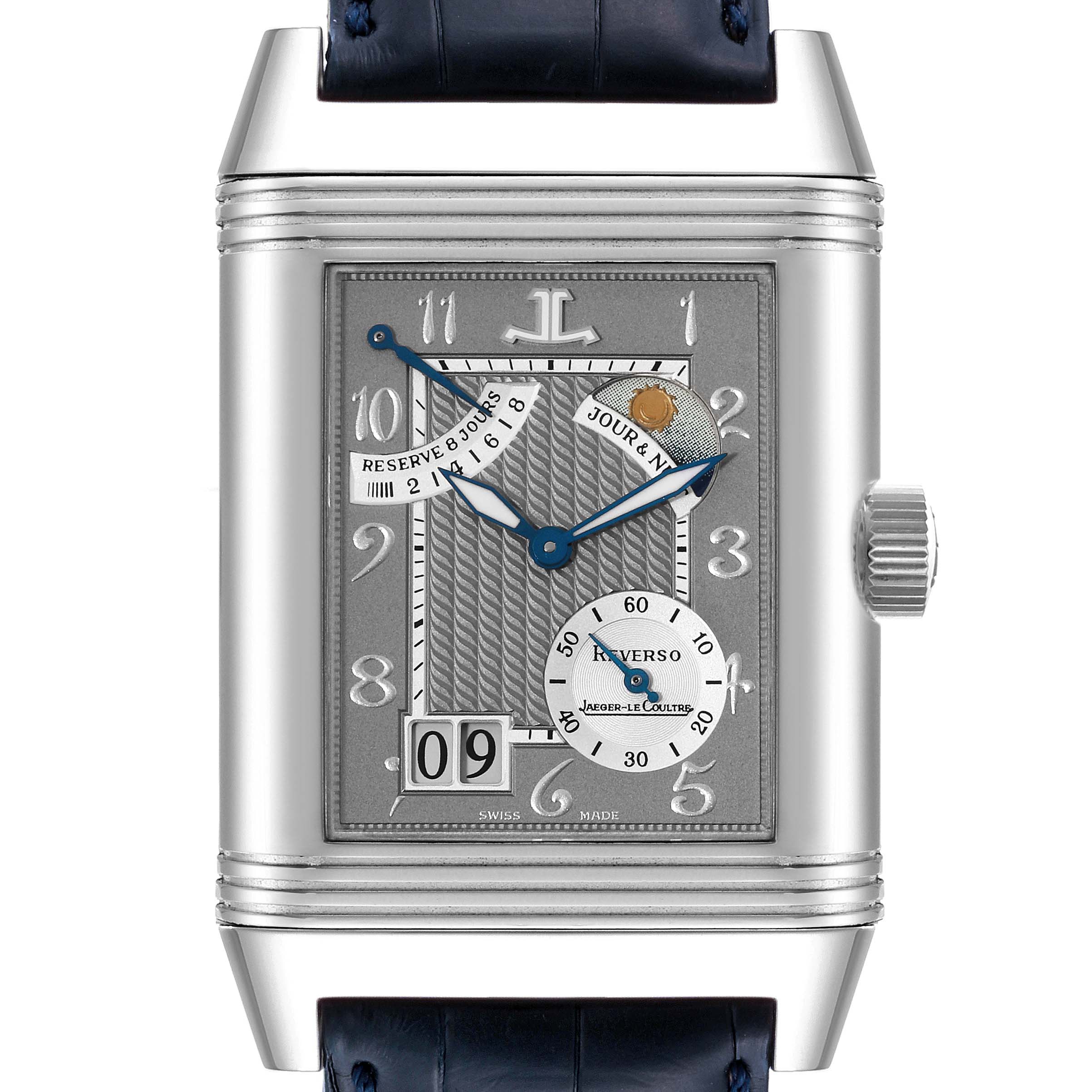 The image shows a front view of a Jaeger-LeCoultre Reverso watch, featuring the dial, hands, crown, and strap attachment.