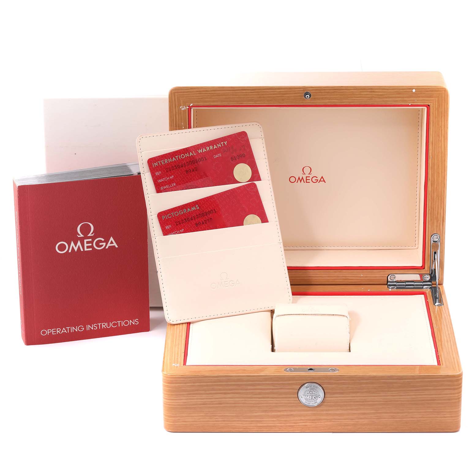 The image shows the packaging, operating instructions, and warranty cards for the Omega Seamaster 212.30.41.20.03.001 Men
s Stainless Steel Blue Dial 212.30.41.20.03.001 Men
s Stainless Steel Blue Dial watch.