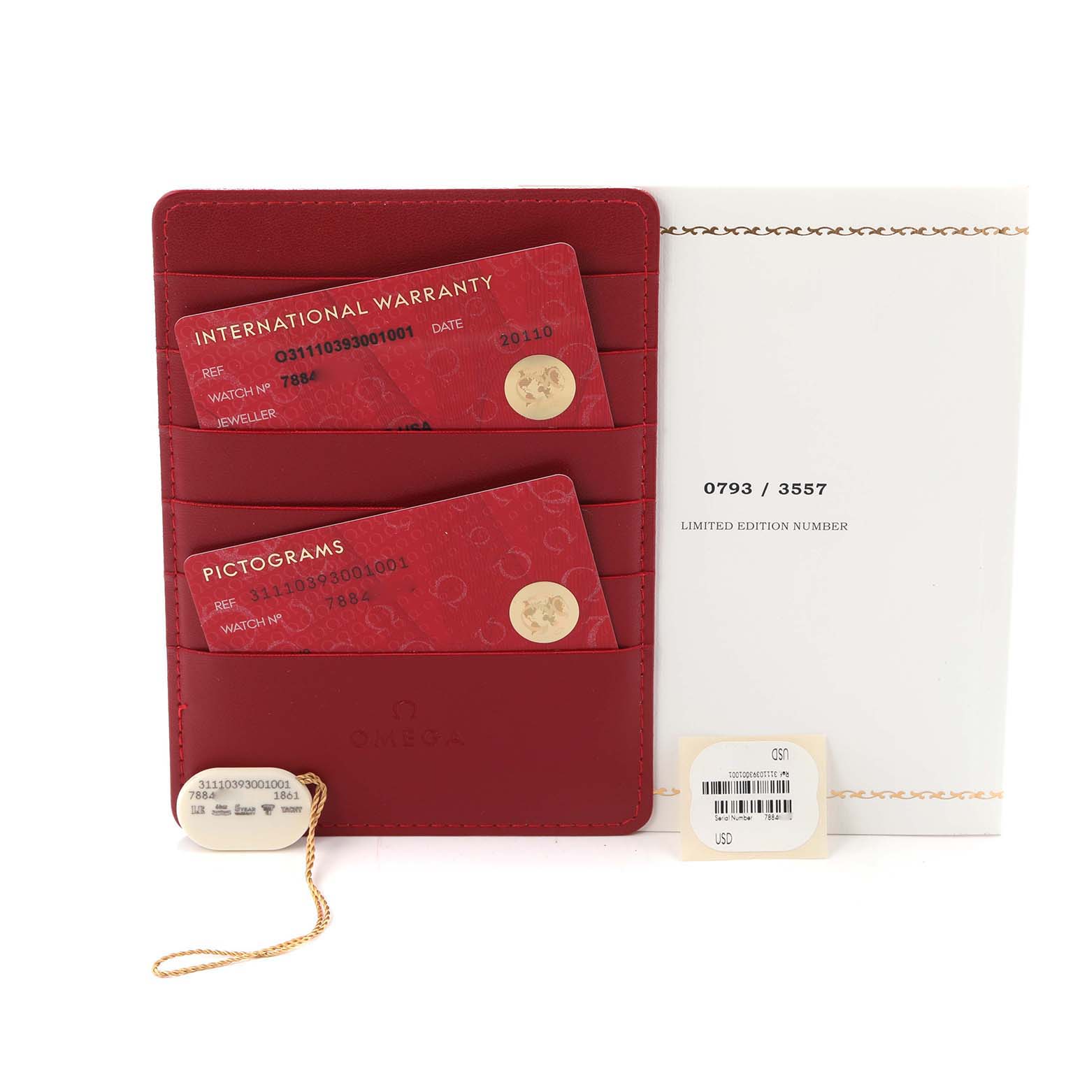 The image shows Omega Speedmaster 311.10.39.30.01.001 Men's Stainless Steel Black Dial accessories: a red cardholder with warranty and pictogram cards, and a limited edition certificate.