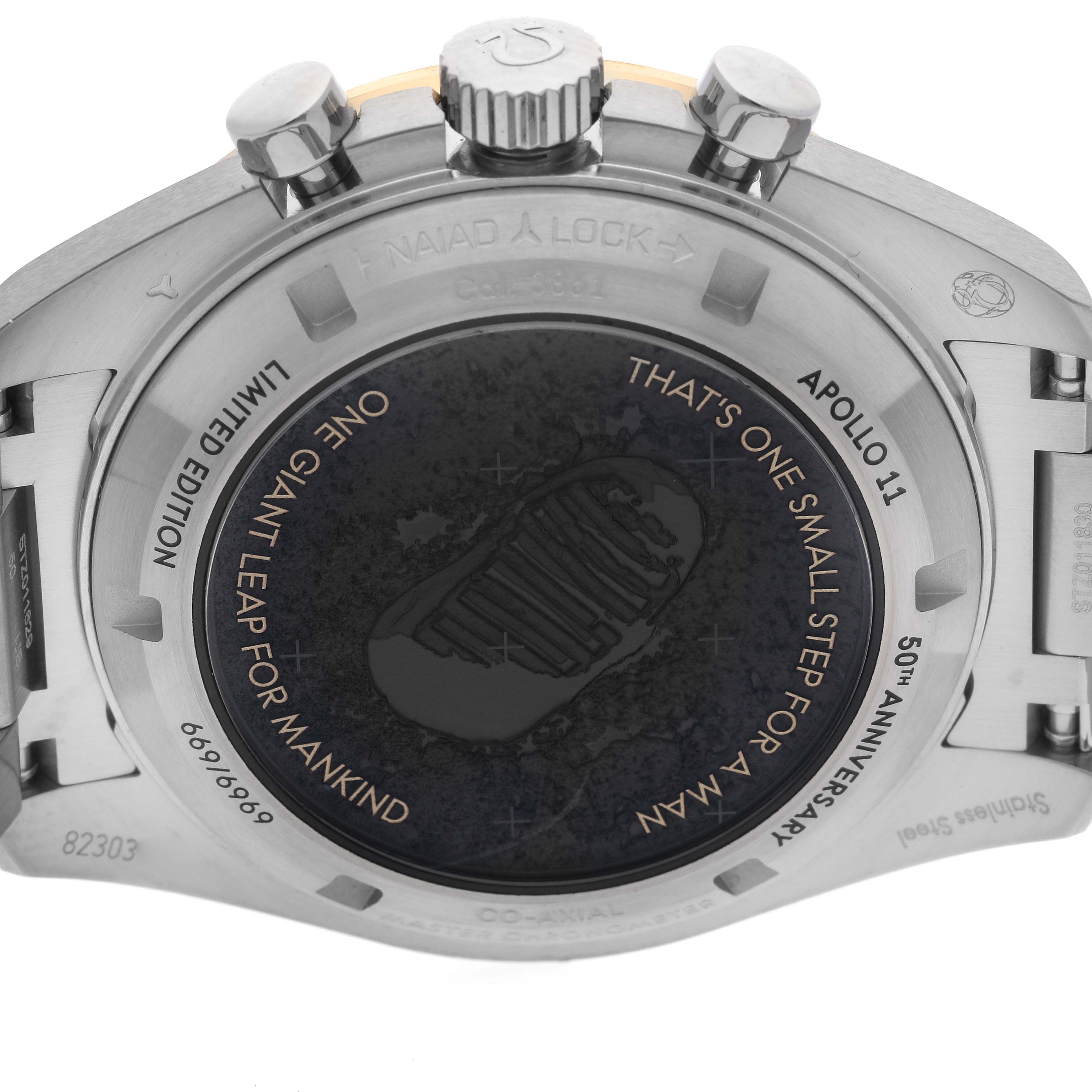 The image shows the back view of an Omega Speedmaster 310.20.42.50.01.001, highlighting the case back with engravings and commemorative details.