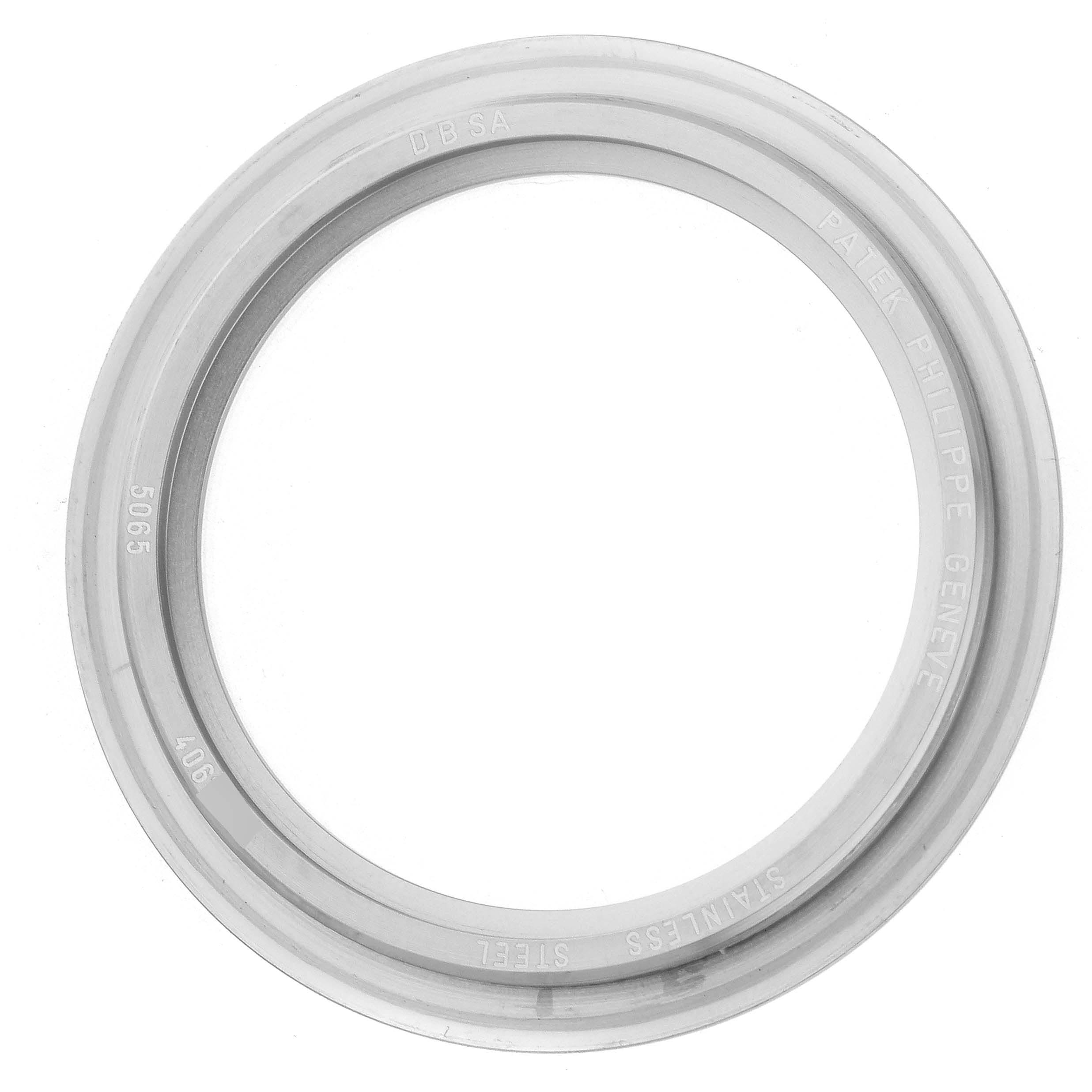 The image shows the stainless steel bezel for the Patek Philippe Aquanaut model 5065/1A-001, photographed directly from above.