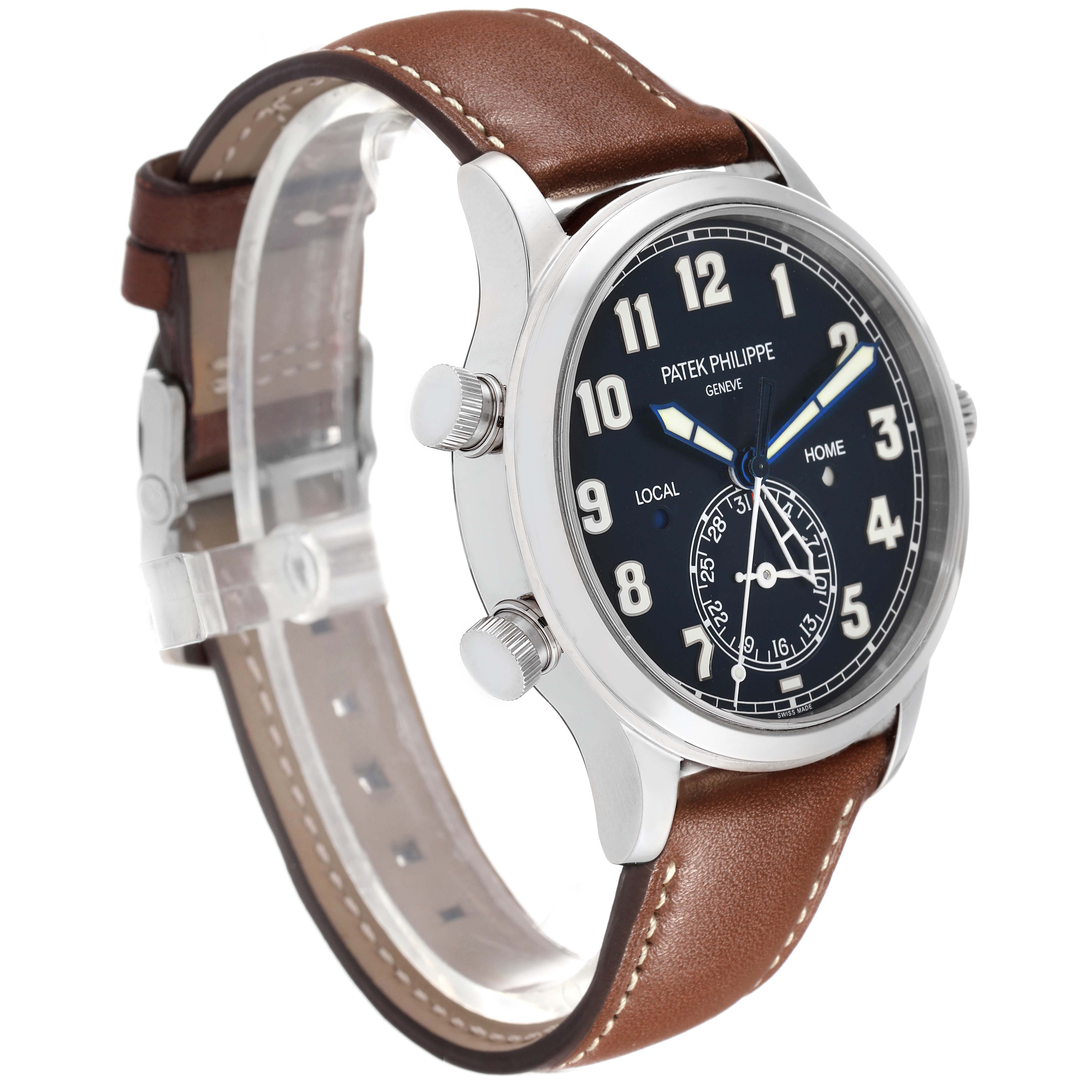 The Patek Philippe Calatrava model 5524G-001 is shown at a three-quarter angle, displaying its brown leather strap, blue dial, pushers, and crown.
