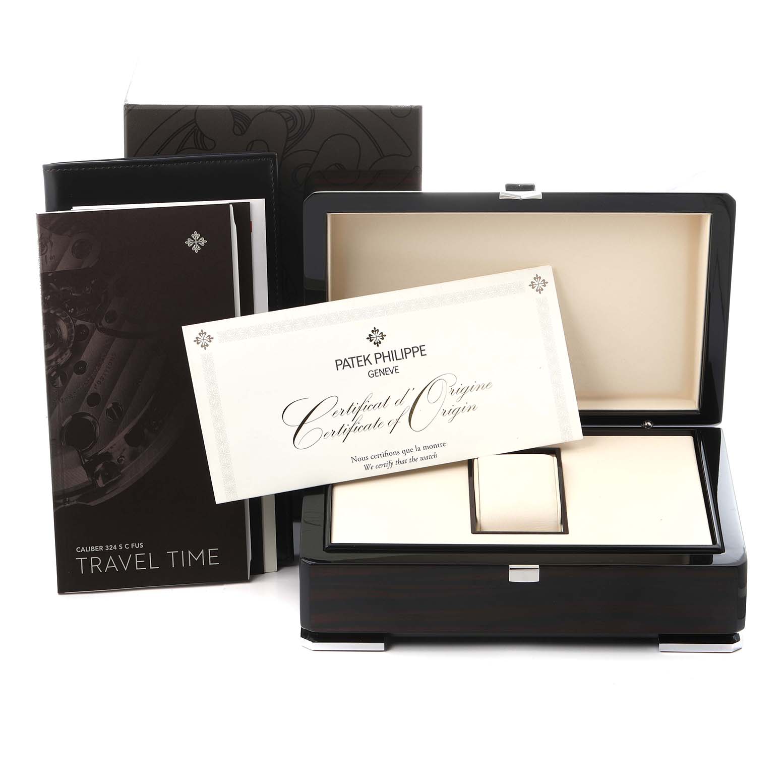 The image shows the packaging and documentation for a Patek Philippe Calatrava model, model number 5524G-001, including its box, certificate, and manuals.