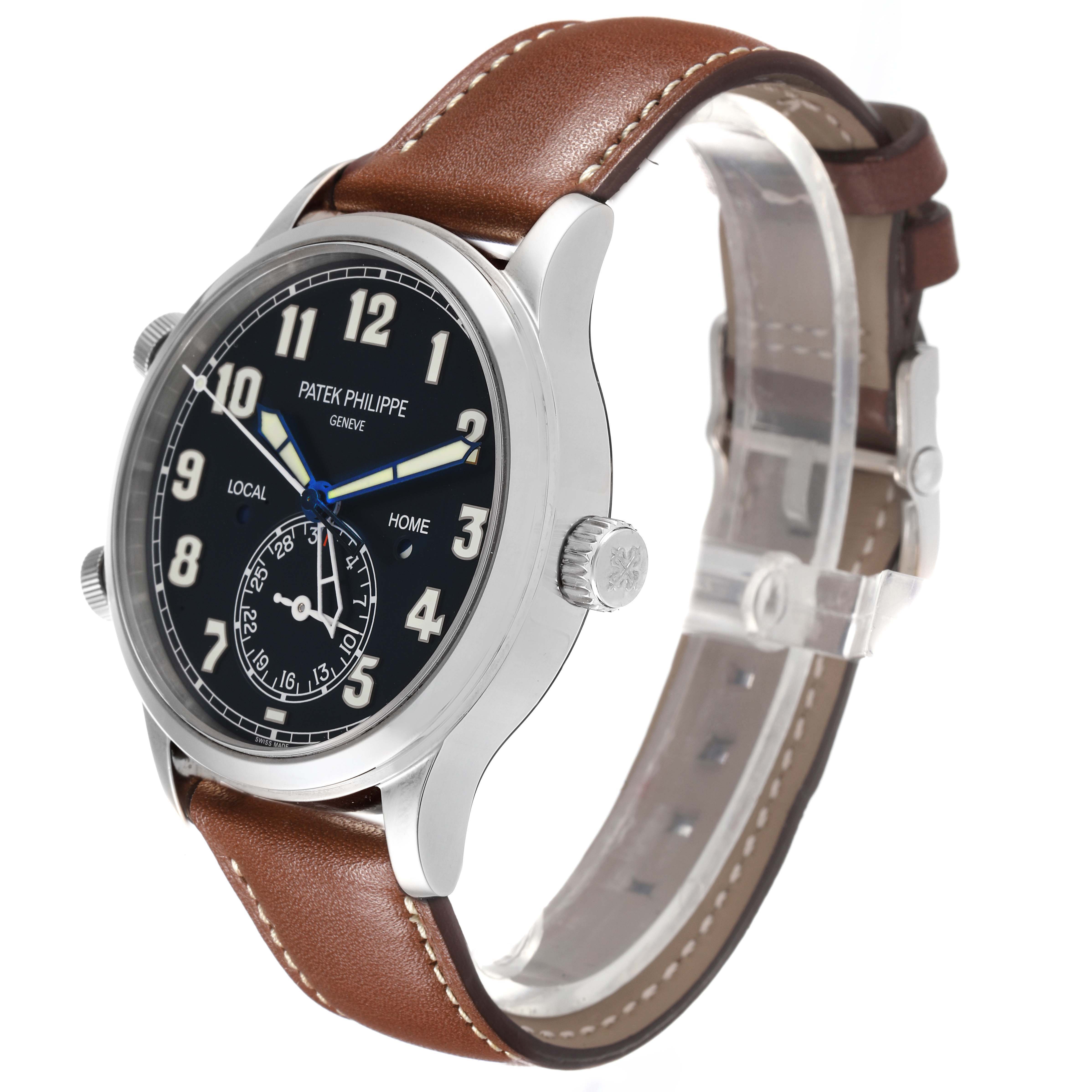 The Patek Philippe Calatrava model 5524G-001 watch is shown from a slight side angle, displaying its black dial, silver case, and brown leather strap.