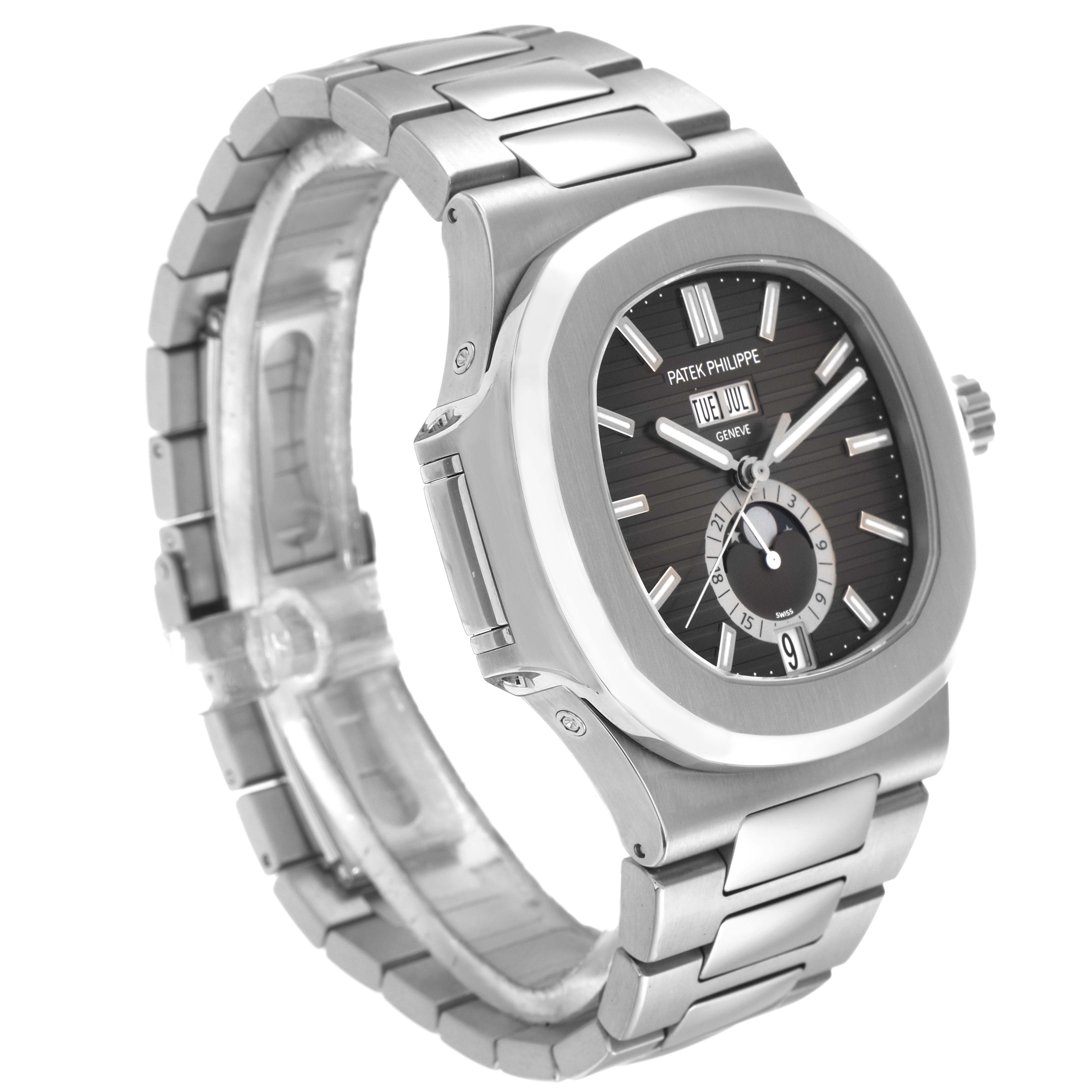 The Patek Philippe Nautilus 5726/1A-014 is shown at an angled side view, highlighting its stainless steel case, bracelet, and the dial with day and date display.