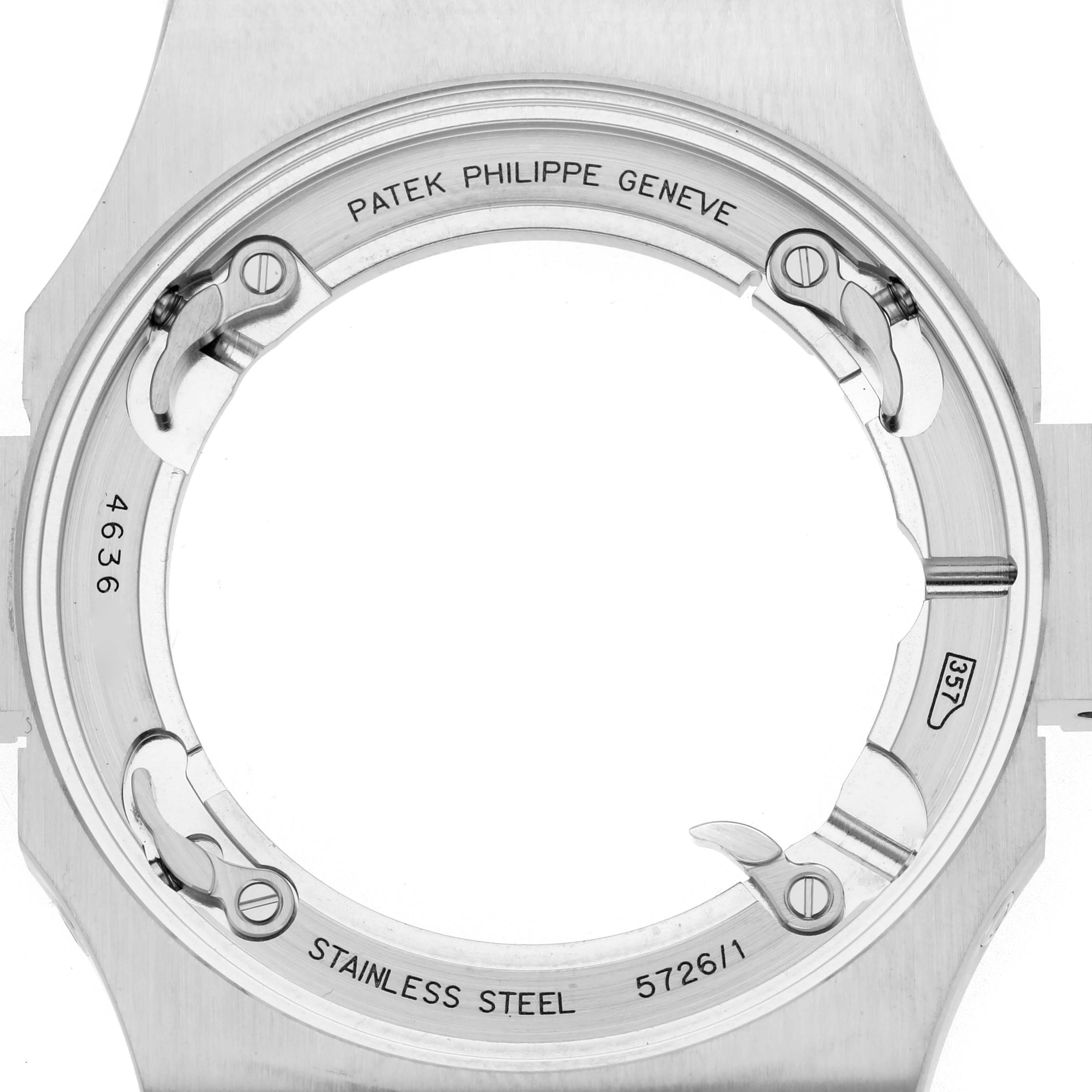 The image shows the case back of the Patek Philippe Nautilus model 5726/1A-014, focusing on the stainless steel frame and clasp components.