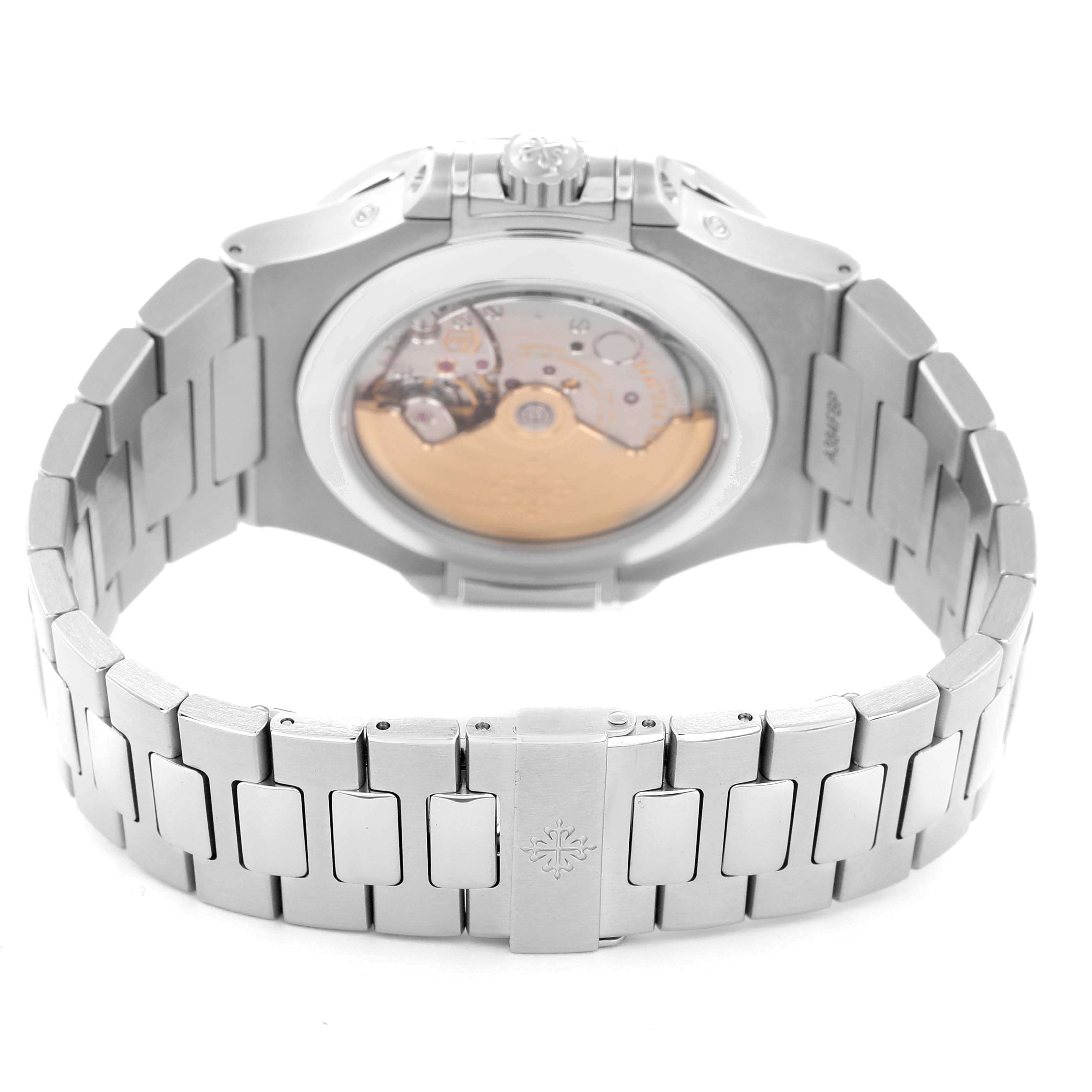 The image shows the back of a Patek Philippe Nautilus model 5726/1A-014, with the movement visible through the transparent case back and the stainless steel bracelet.