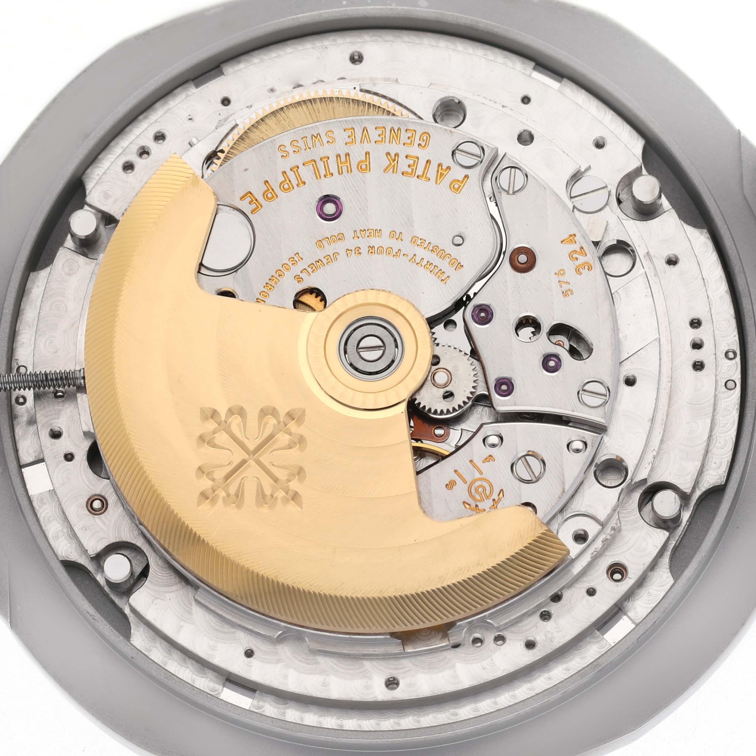 The image shows the back of a Patek Philippe Nautilus model 5726/1A-014, highlighting its exposed movement and rotor.