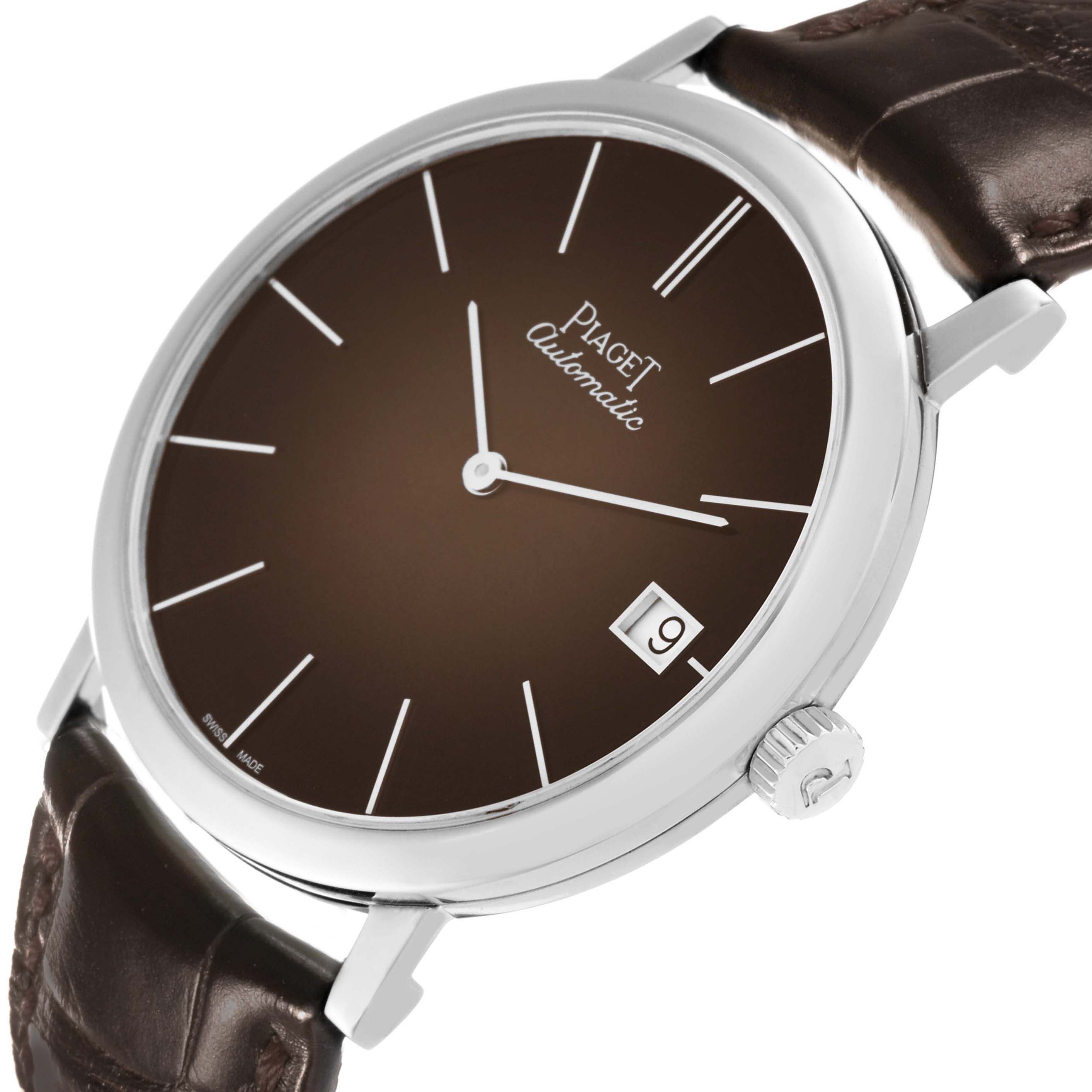 The Piaget G0A42050 Men's White Gold Brown Dial Altiplano G0A42050 watch is shown at an angle highlighting the face, crown, and brown leather strap with a date window visible.