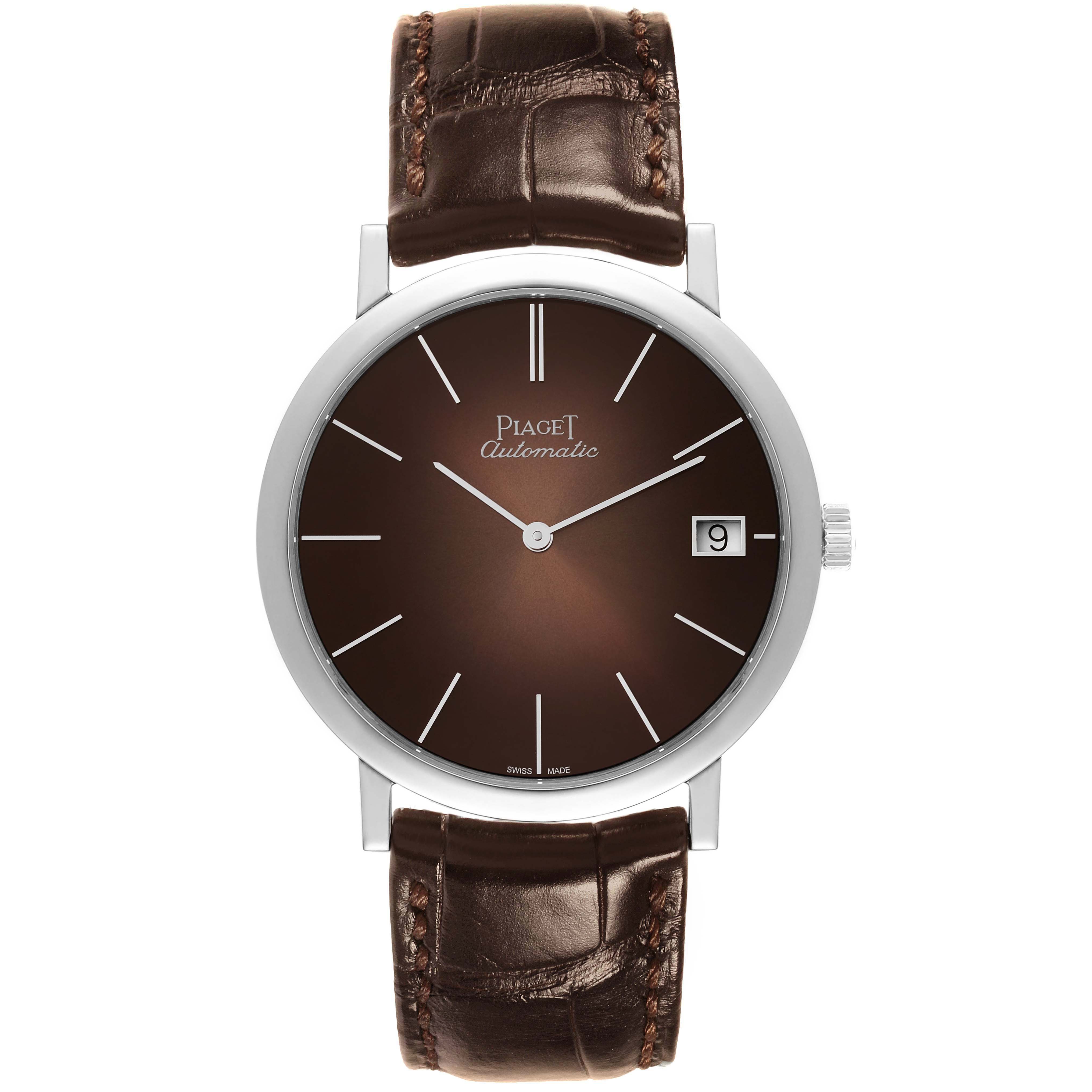 The Piaget G0A42050 Men's White Gold Brown Dial Altiplano G0A42050 watch is shown from a top view, highlighting its dial, case, strap, and crown.