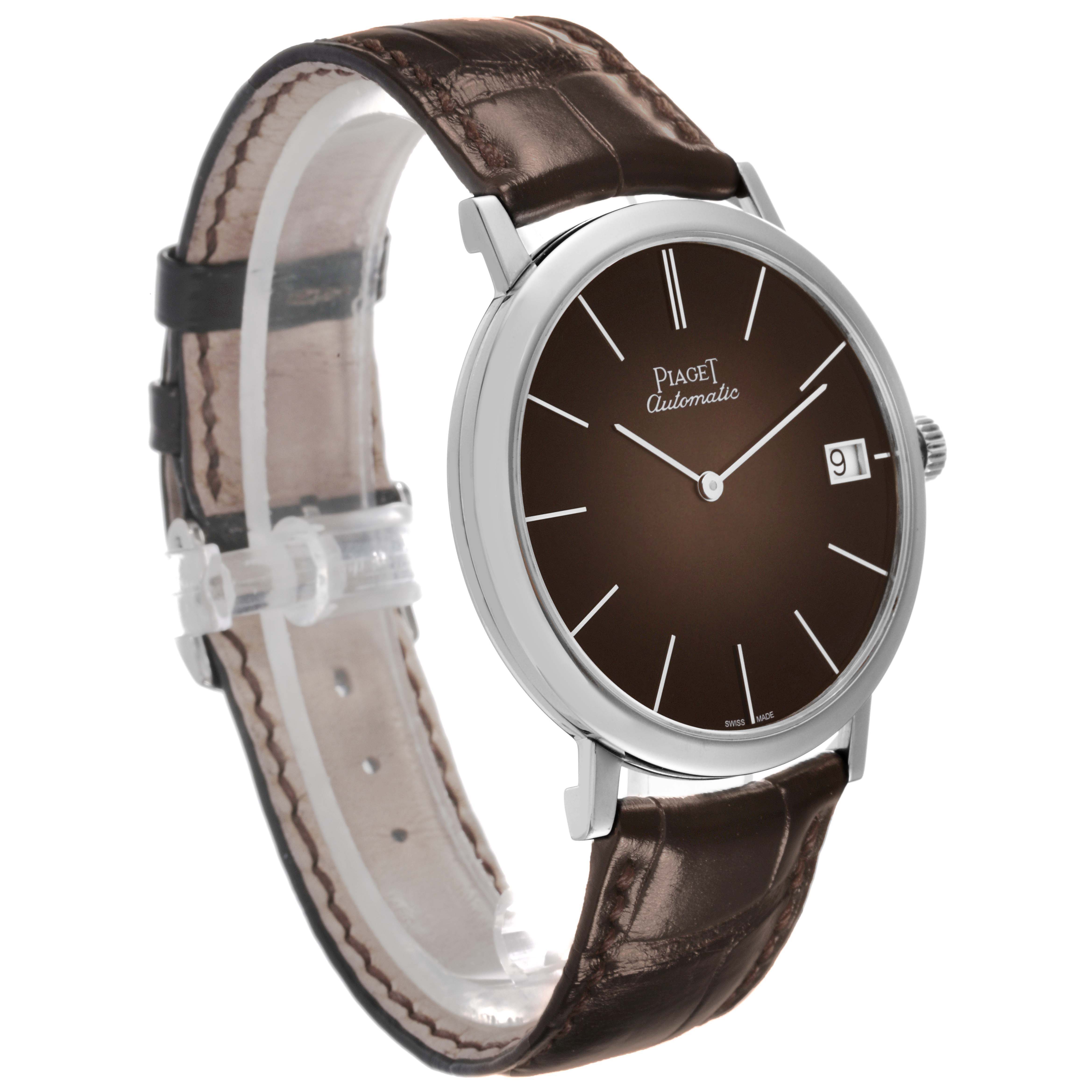 The Piaget G0A42050 Men's White Gold Brown Dial Altiplano G0A42050 watch is shown at a three-quarter angle, highlighting the face, bezel, strap, and crown.