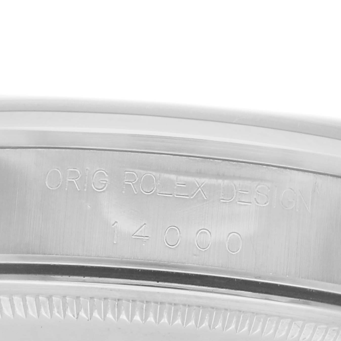 The image shows an angled close-up of the Rolex Air-King model 14000, focusing on the engraved bezel design details.
