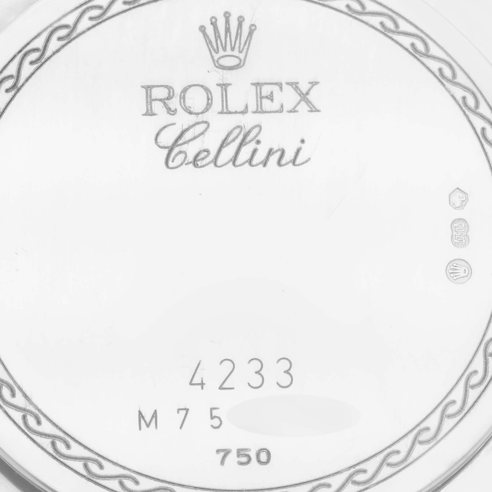 The image shows an angled close-up of the back case of the Rolex Cellini 4233 Men's Rose Gold Black Dial 4233 Men's Rose Gold Black Dial model, displaying its logo, name, and serial number.